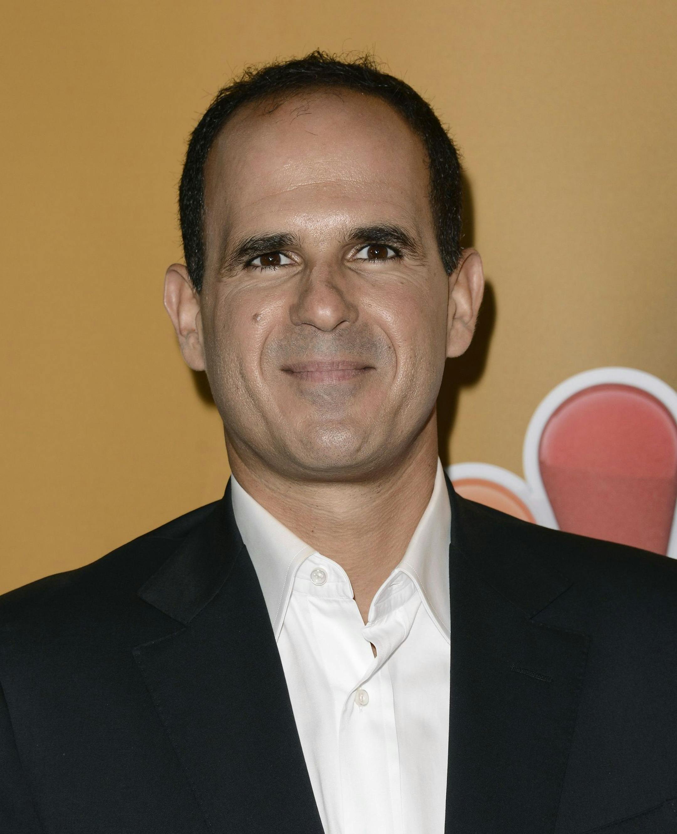 FILE - In this July 27, 2013, file photo, television personality Marcus Lemonis arrives at the NBC 2013 summer press tour at the Beverly Hilton Hotel in Beverly Hills, Calif. On his CNBC program, "The Profit," Lemonis invests in businesses and works with his new co-owners to fix every aspect of the companies. (Photo by Dan Steinberg/Invision/AP, File) ORG XMIT: NYBZ131