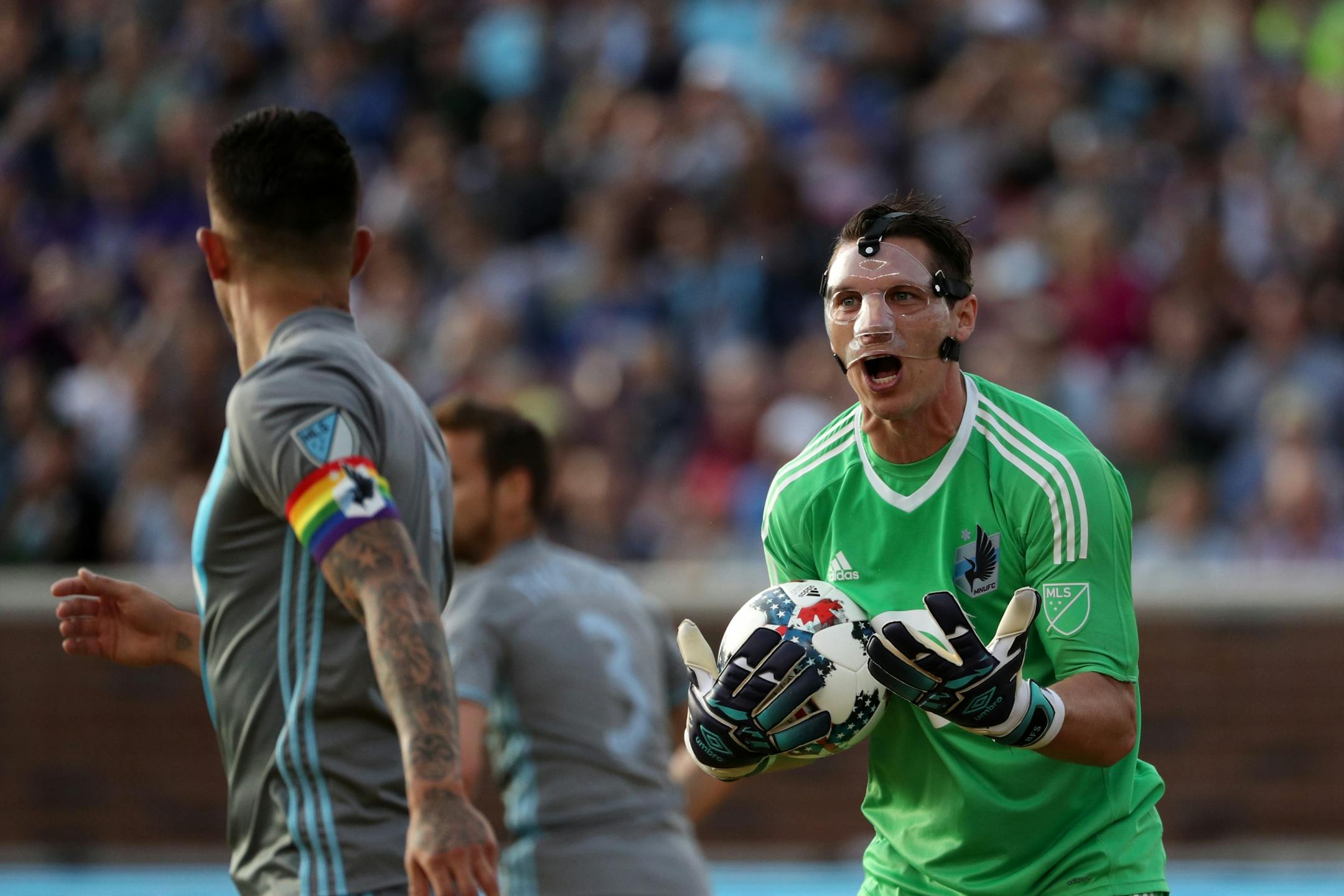 Minnesota United goalkeeper Bobby Shuttleworth (33) yelled to his teammate Minnesota United defender Francisco Calvo (5) after Orlando City SC forward Cyle Larin (9) took a shot on goal in the first half.