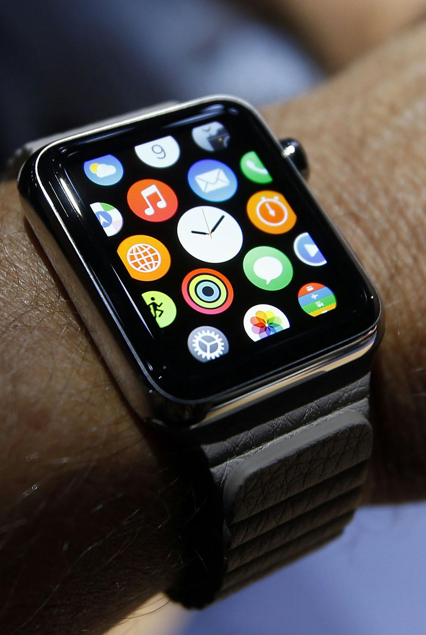 A new Apple smartwatch is demonstrated at the Flint Center on Tuesday, Sept. 9, 2014, in Cupertino, Calif. (Karl Mondon/Bay Area News Group/MCT) ORG XMIT: 1157131