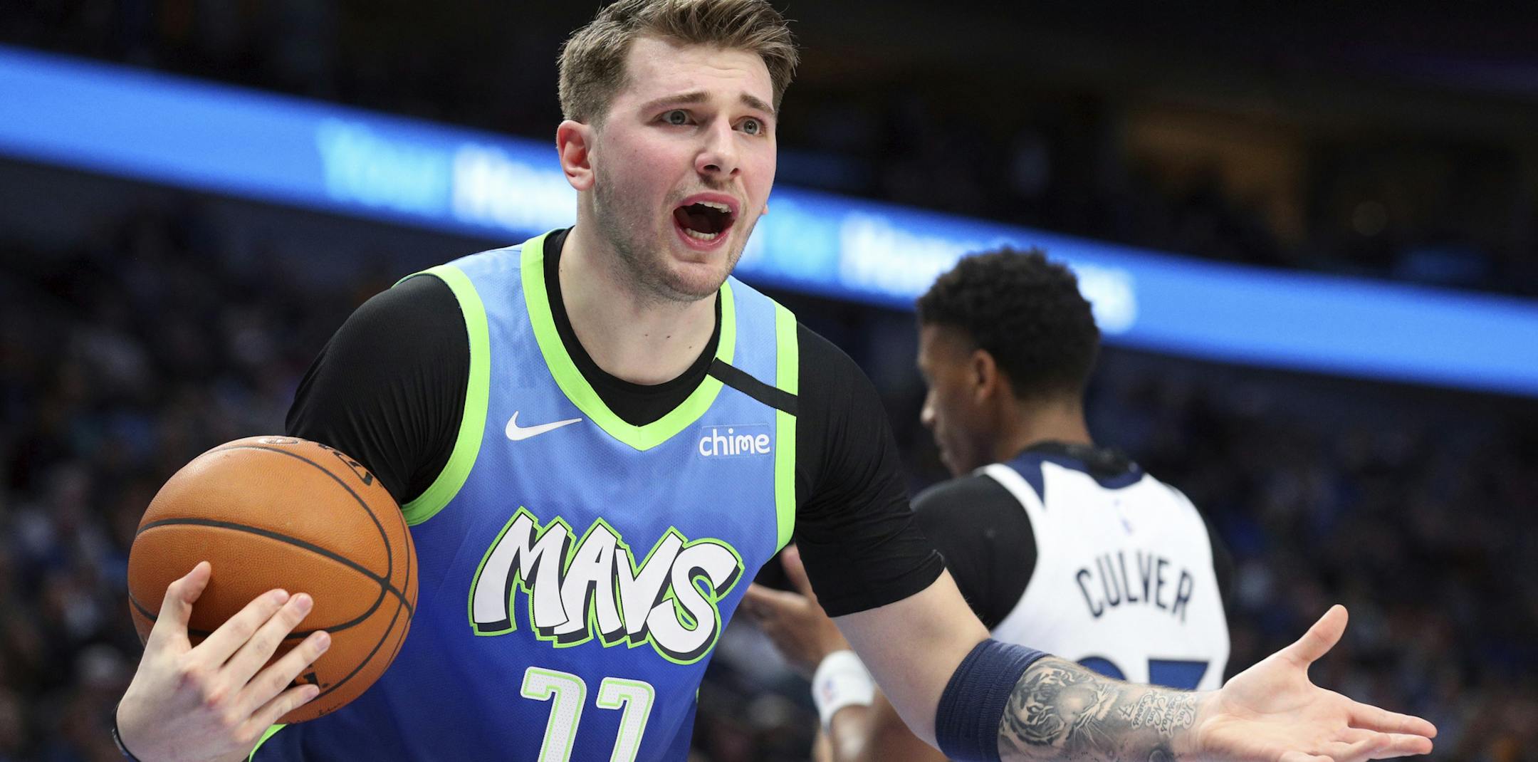 Dallas Mavericks guard Luka Doncic (77) reacts after a foul call in the first half during an NBA basketball game against the Minnesota Timberwolves, Monday, Feb. 24, 2020, in Dallas. (AP Photo/Richard Rodriguez)