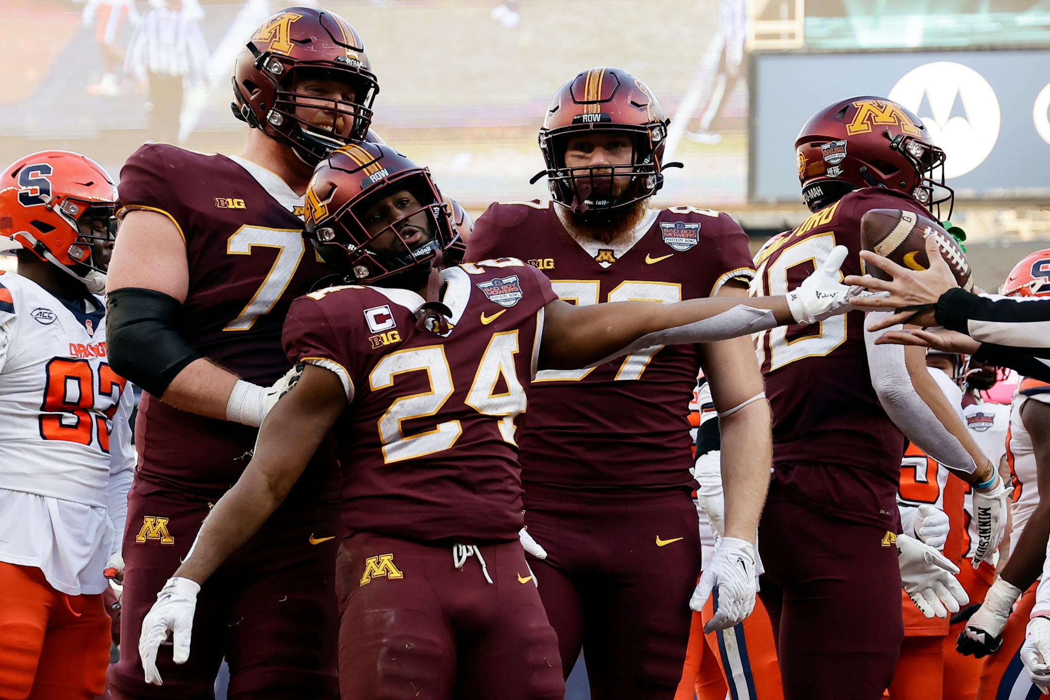Minnesota running back Mohamed Ibrahim (24) reacts after scoring a touchdown against Syracuse during the first half of the Pinstripe Bowl NCAA college football game, Thursday, Dec. 29, 2022, in New York.