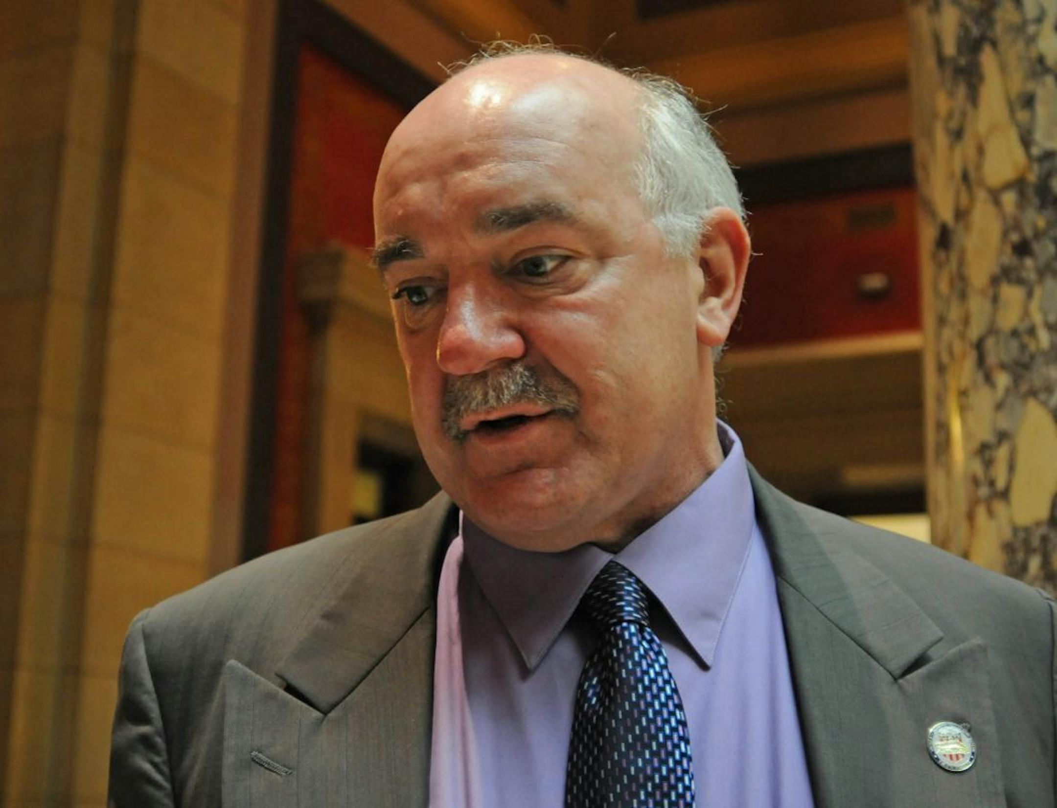 Gov. Mark Dayton announced the agreement to build a new Minnesota Vikings stadium during a press conference in the Governor's reception room at the State Capital on Thursday morning March 1,2011 1 Sen.Dave Tomassoni reacts to the stadium agreement.