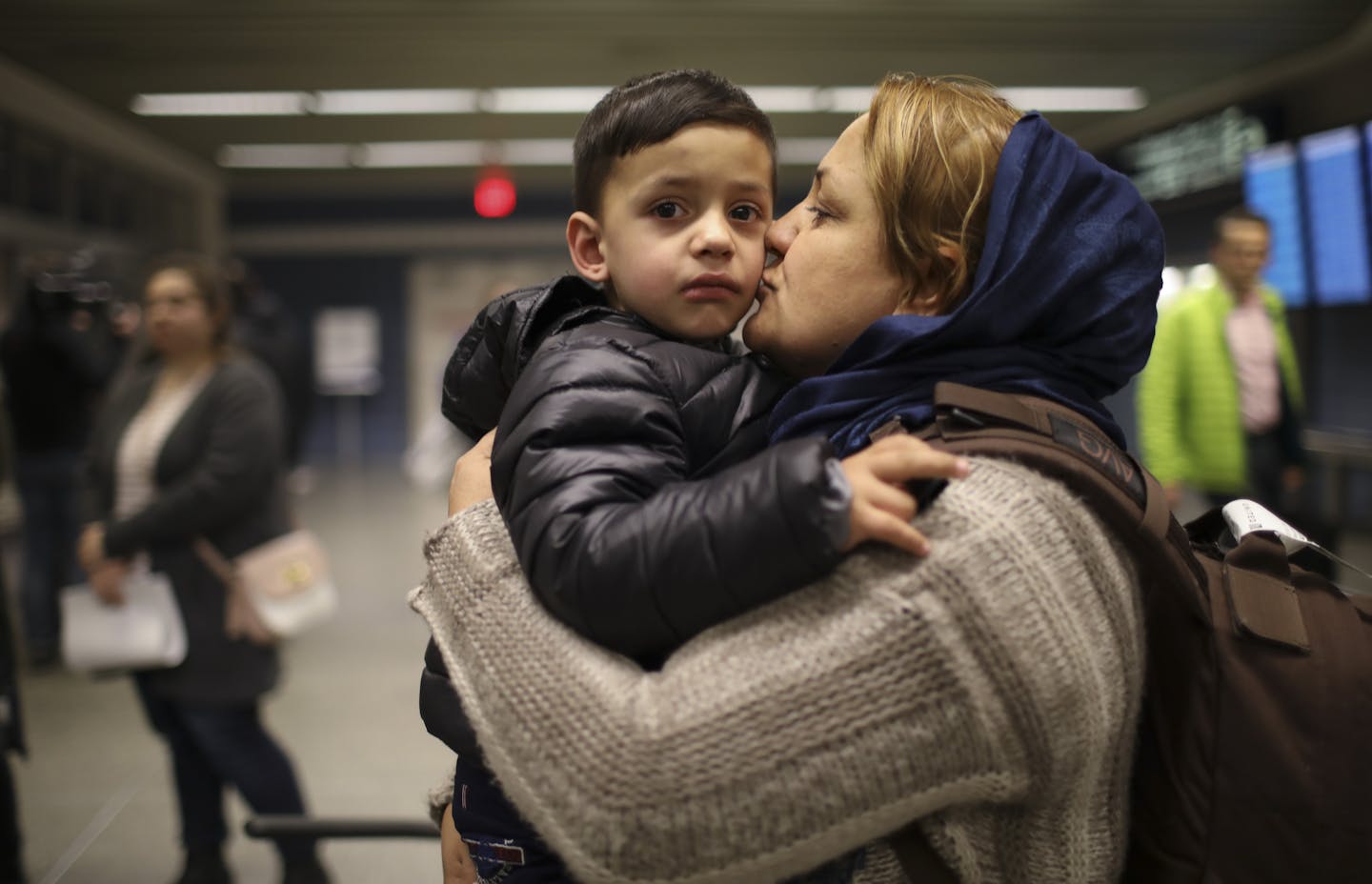 Marzeeya kissed her son, Abobakar, 3, as they got ready to leave MSP airport after their journey from Afghanistan. ] JEFF WHEELER &#xef; jeff.wheeler@startribune.com With assistance from the International Institute of Minnesota, Ahmad Jawid Masoumi, his wife, and their five children arrived in Minnesota late Thursday night, February 2, 2017 after leaving Afghanistan.