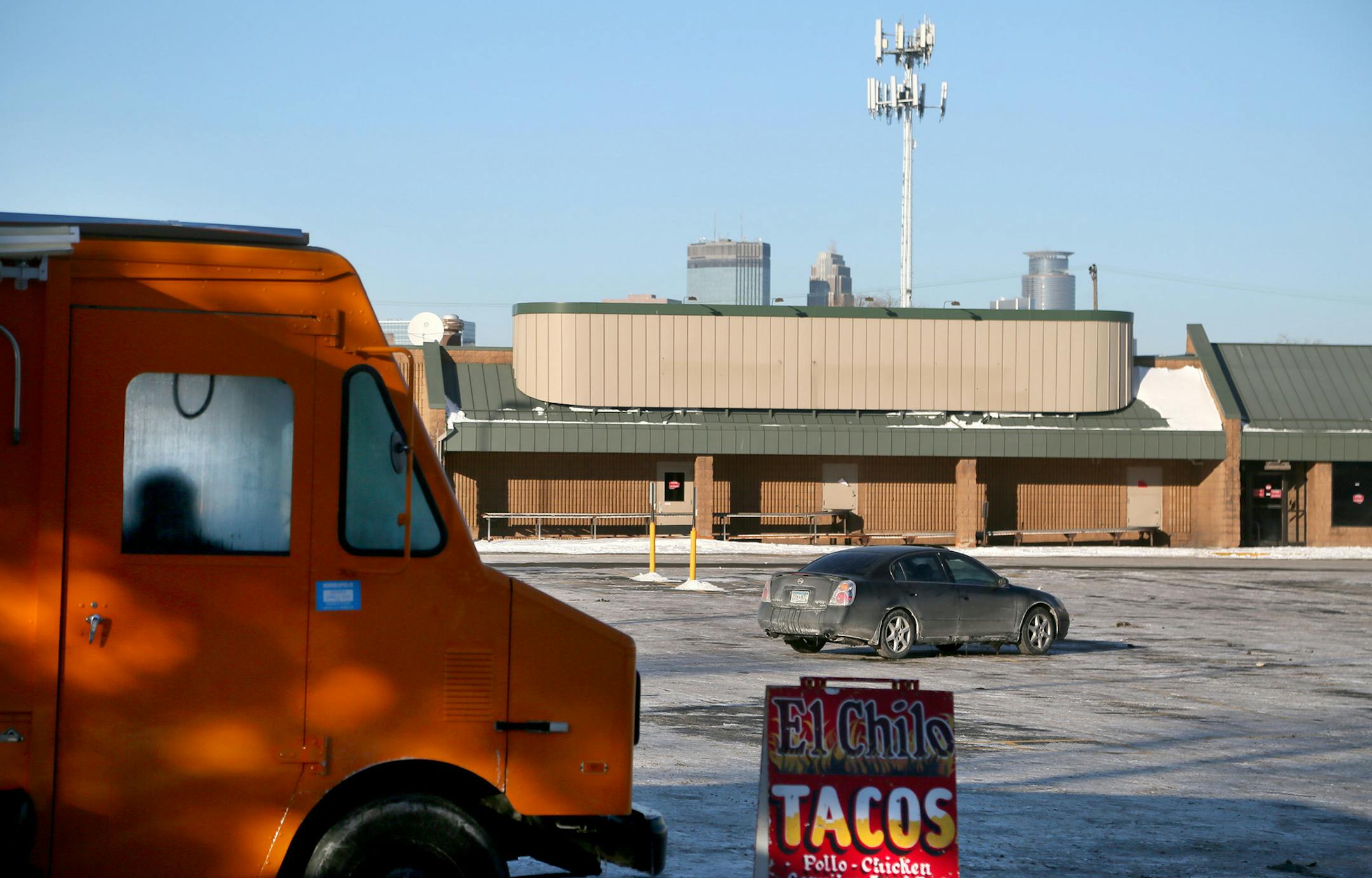 The site for a potential developer for Walgreens, which now houses a shuttered Supervalu and parking lot, left, seen Tuesday, Jan.13, 2015, in Minneapolis, MN.](DAVID JOLES/STARTRIBUNE)djoles@startribune.com A developer for Walgreens is buying a key part of the Kmart site on Nicollet Avenue, throwing a curve ball at city officials trying to reopen the intersection.