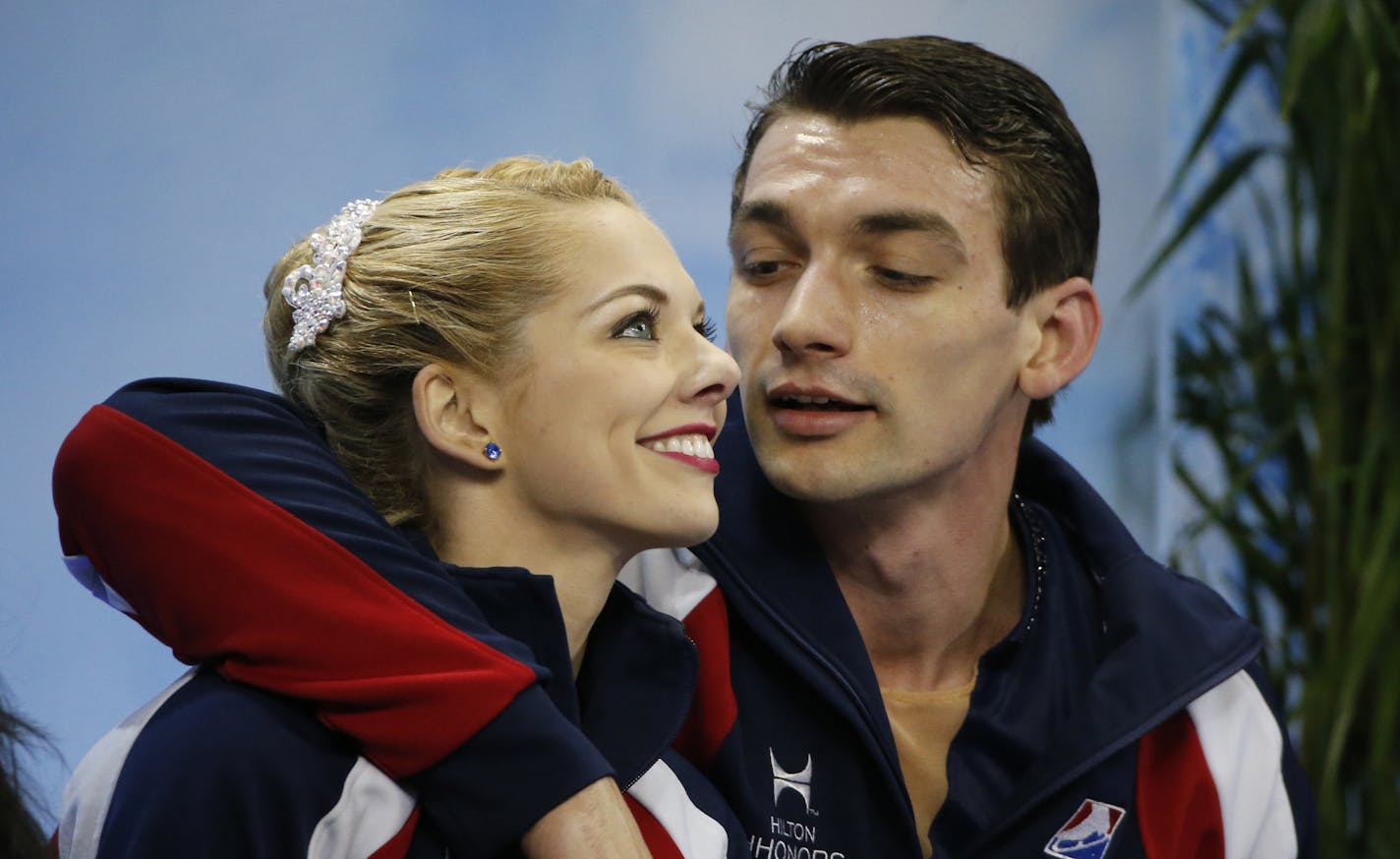 Alexa Scimeca and Chris Knierim of the United States wait for their score after their Pairs Free Skating performance in the ISU World Figure Skating Championship 2015 held at the Oriental Sports Center in Shanghai, China, Thursday, March 26, 2015. (AP Photo/Ng Han Guan) ORG XMIT: XHG253