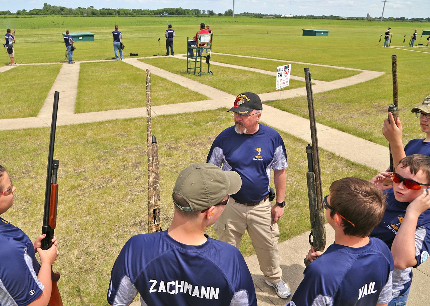 Pep talk: A coach of the Howard Lake-Waverly-Winstead trapshooting team gave final instructions before his squad shot trap on Thursday in Alexandria.