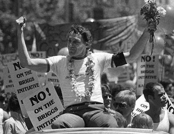 ADVANCE FOR USE SUNDAY, JUNE 9, 2013 AND THEREAFTER - FILE - In this June 26, 1978 file photo, San Francisco Supervisor Harvey Milk greets the crowd a