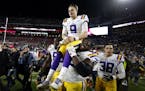Heisman Trophy winner Joe Burrow was carried off the field by teammates after LSU defeated Alabama this season. His father was once an assistant coach