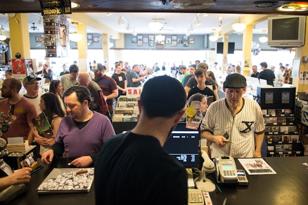 Throngs of music lovers purchased music at Electric Fetus Records Saturday as the store hosted a Record Store Day celebration. ] (AARON LAVINSKY/STAR 
