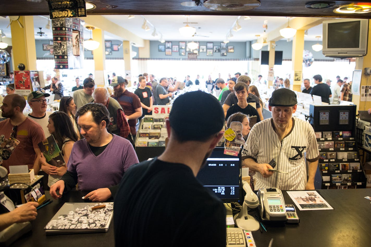 Throngs of music lovers purchased music at Electric Fetus Records Saturday as the store hosted a Record Store Day celebration. ] (AARON LAVINSKY/STAR TRIBUNE) aaron.lavinsky@startribune.com Record Store Day was celebrated at Electric Fetus Records on Saturday, April 16, 2016 in Minneapolis, Minn.