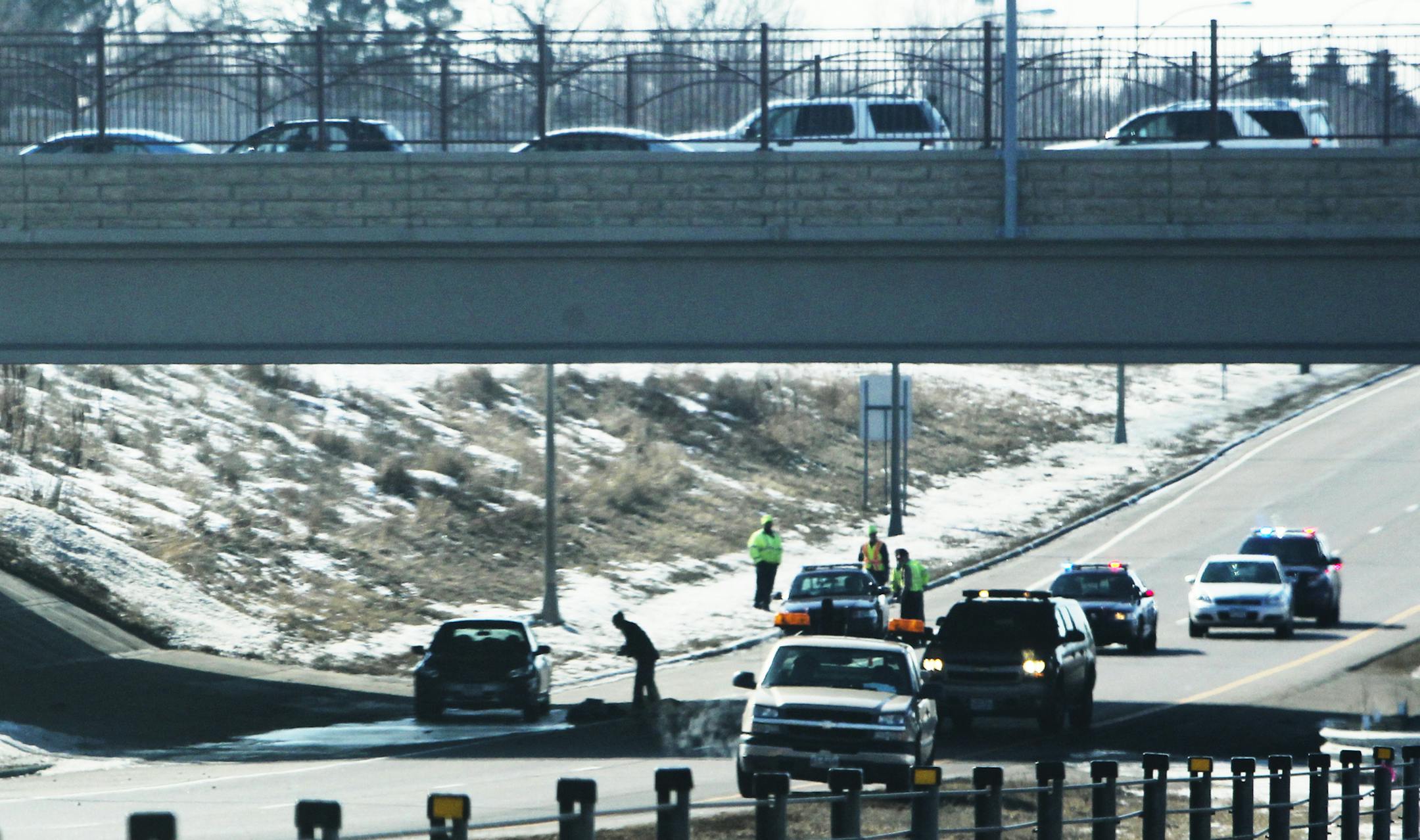 The scene of a fatal accident, possibly involving a pedestrian or motorist out of their car, on northbound I-169, beneath Pioneer Trail, Wednesday March 13, 2013, 2013, in Bloomington, MN.] (DAVID JOLES/STARTRIBUNE) djoles@startribune.com The scene of a fatal accident, possibly involving a pedestrian or motorist out of their car, on northbound I-169 at beneath Pioneer Trail Wednesday March 13, 2013, 2013, in Bloomington, MN.