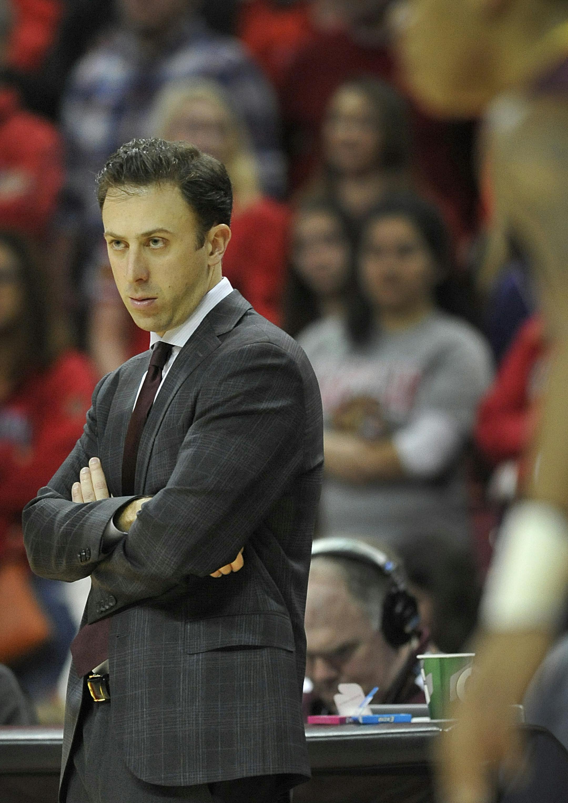 Minnesota coach Richard Pitino watches during the first half of an NCAA college basketball game against Maryland, Saturday, Jan. 3, 2015 in College Park, Md. Maryland won 70-58. (AP Photo/Gail Burton)