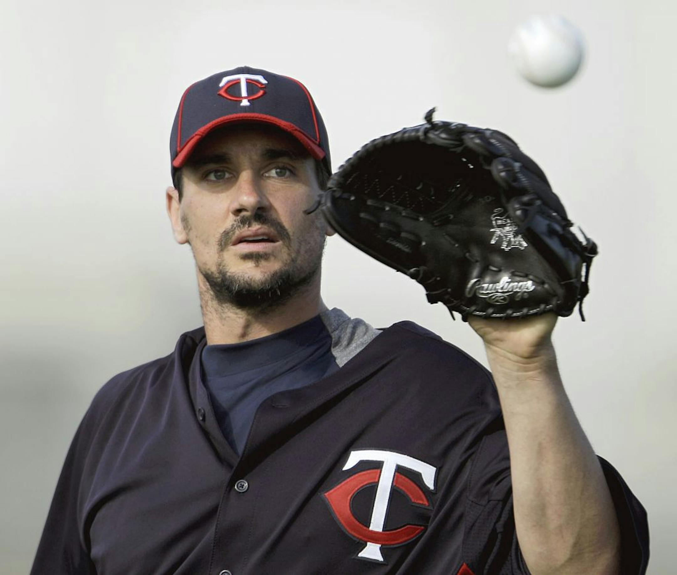 Carl Pavano: A former classmate is under investigation for trying to force the Twins pitcher to buy him a vehicle.