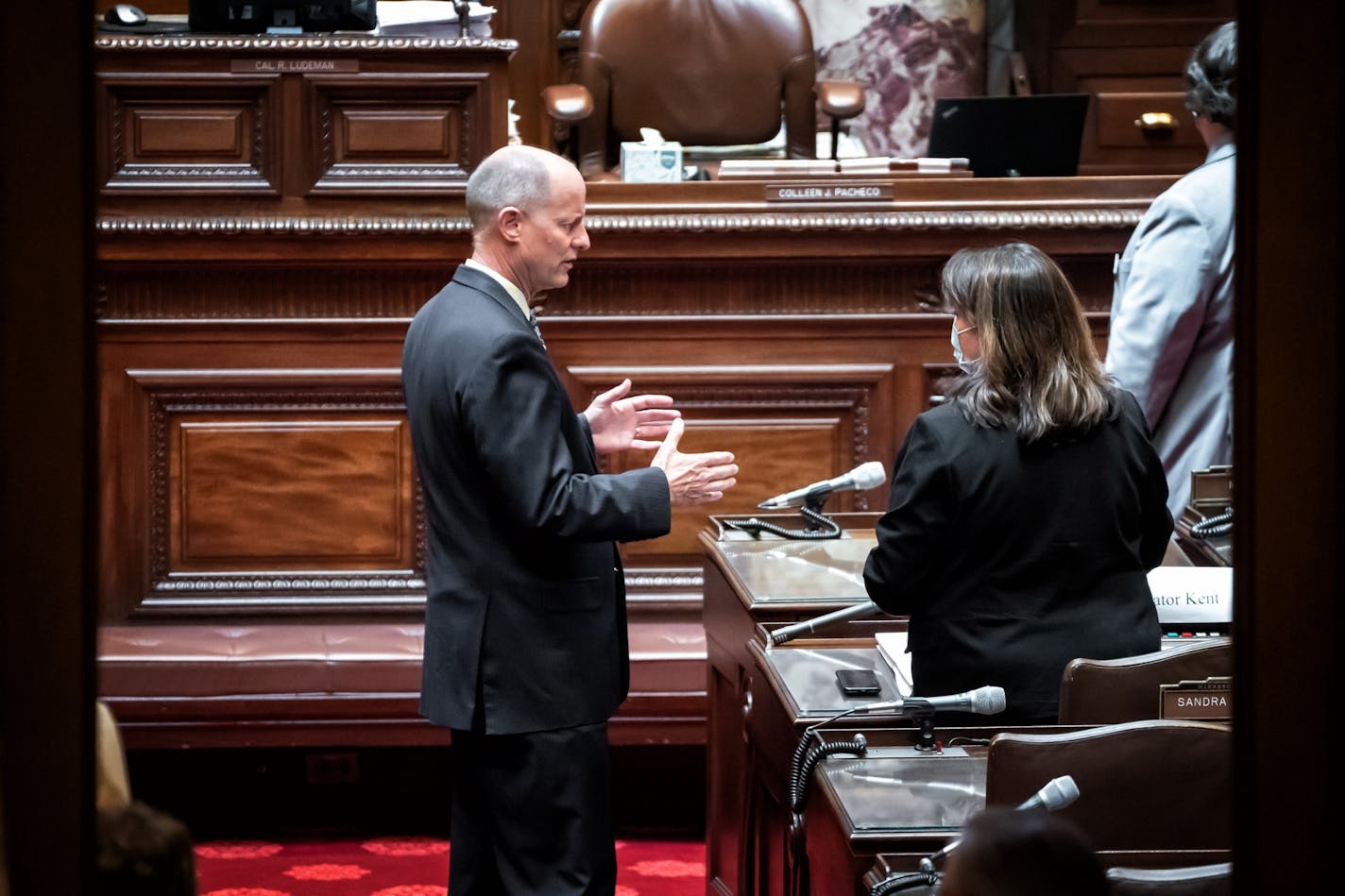 Senate Majority Leader Paul Gazelka, R-East Gull Lake, talked with Senate Minority Leader Susan Kent, DFL-Woodbury on the Senate Floor before the start of the special session Friday.