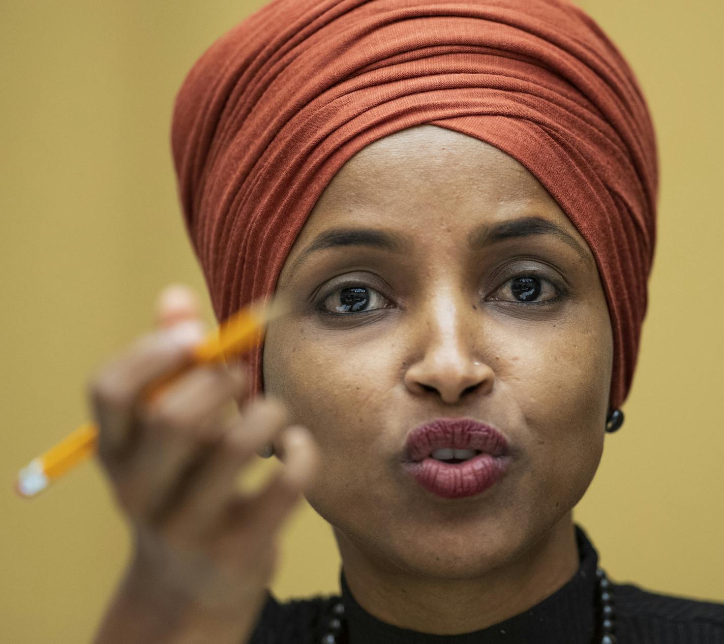 FILE - in this Sept. 24, 2019 file photo, Rep. Ilhan Omar, D-Minn., speaks on Capitol Hill in Washington. Rep. Omar has filed for divorce from her husband. The freshman Democrat cited an "irretrievable breakdown" of her marriage with Ahmed Hirsi in her filing Friday, Oct. 4, 2019, in Hennepin County District Court. (AP Photo/Manuel Balce Ceneta File)