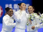 Suni Lee of St. Paul celebrates with teammates after being introduced as a member of the U.S. Olympic team in women's gymnastics at Target Center on J