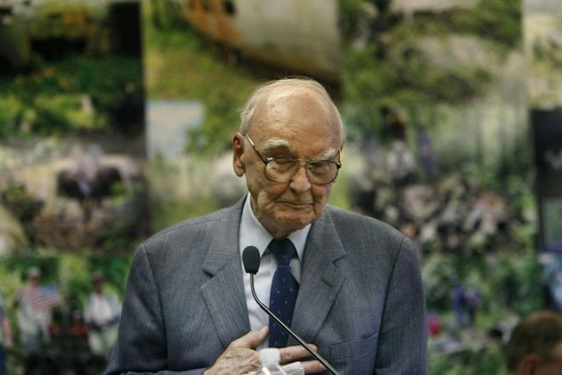 Richard L. Carroll, 89, of Eagan, MN, became emotional as he thanked the MIA Missions group for their efforts in retrieving remains from Papua New Guinea. Carroll served in the Army during WWII and said he was shot and kept as a prisoner of war.