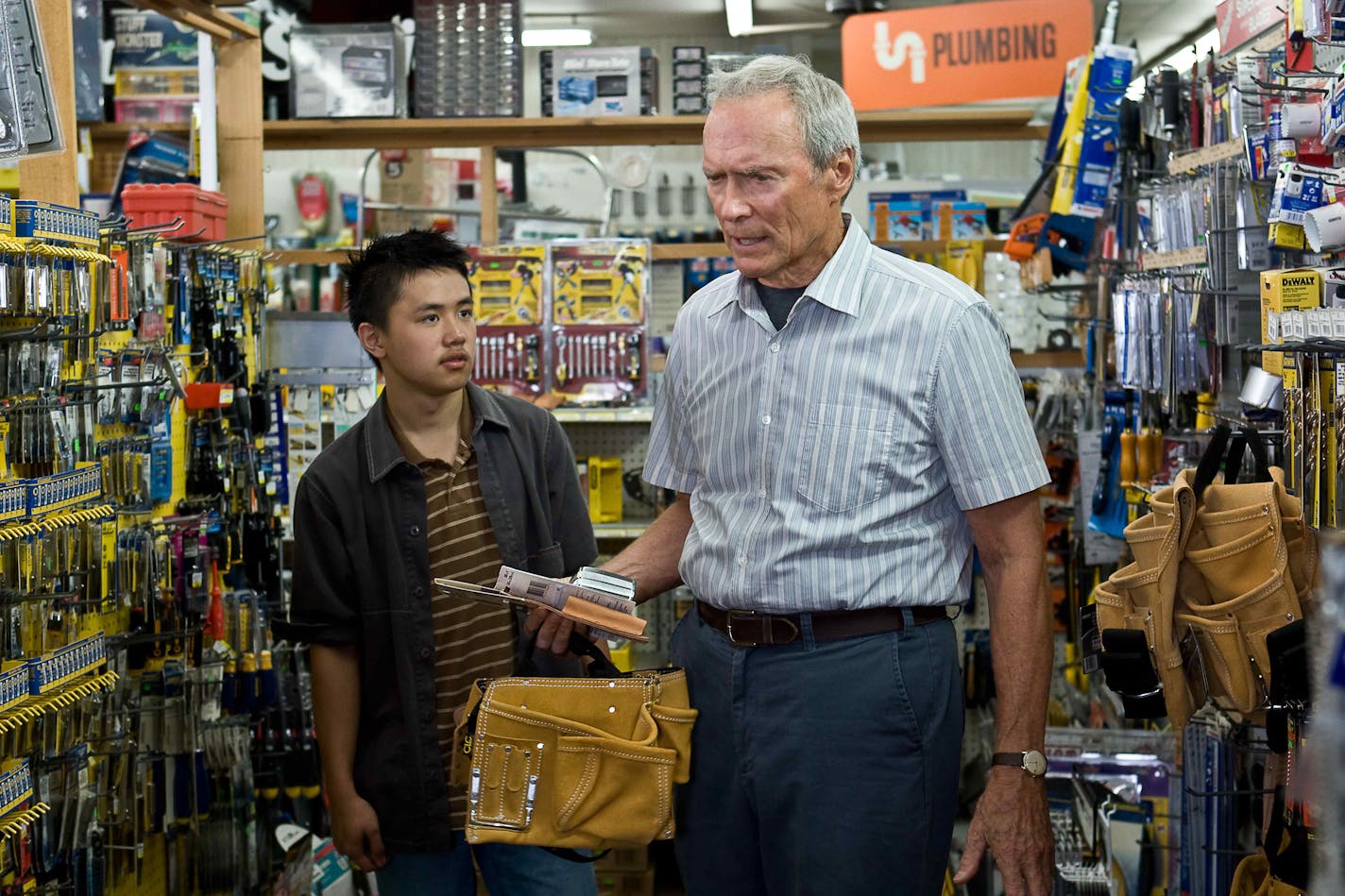 In this image released by Warner Bros. Pictures, Bee Vang, left, and Clint Eastwood are shown in a scene from, "Gran Torino."