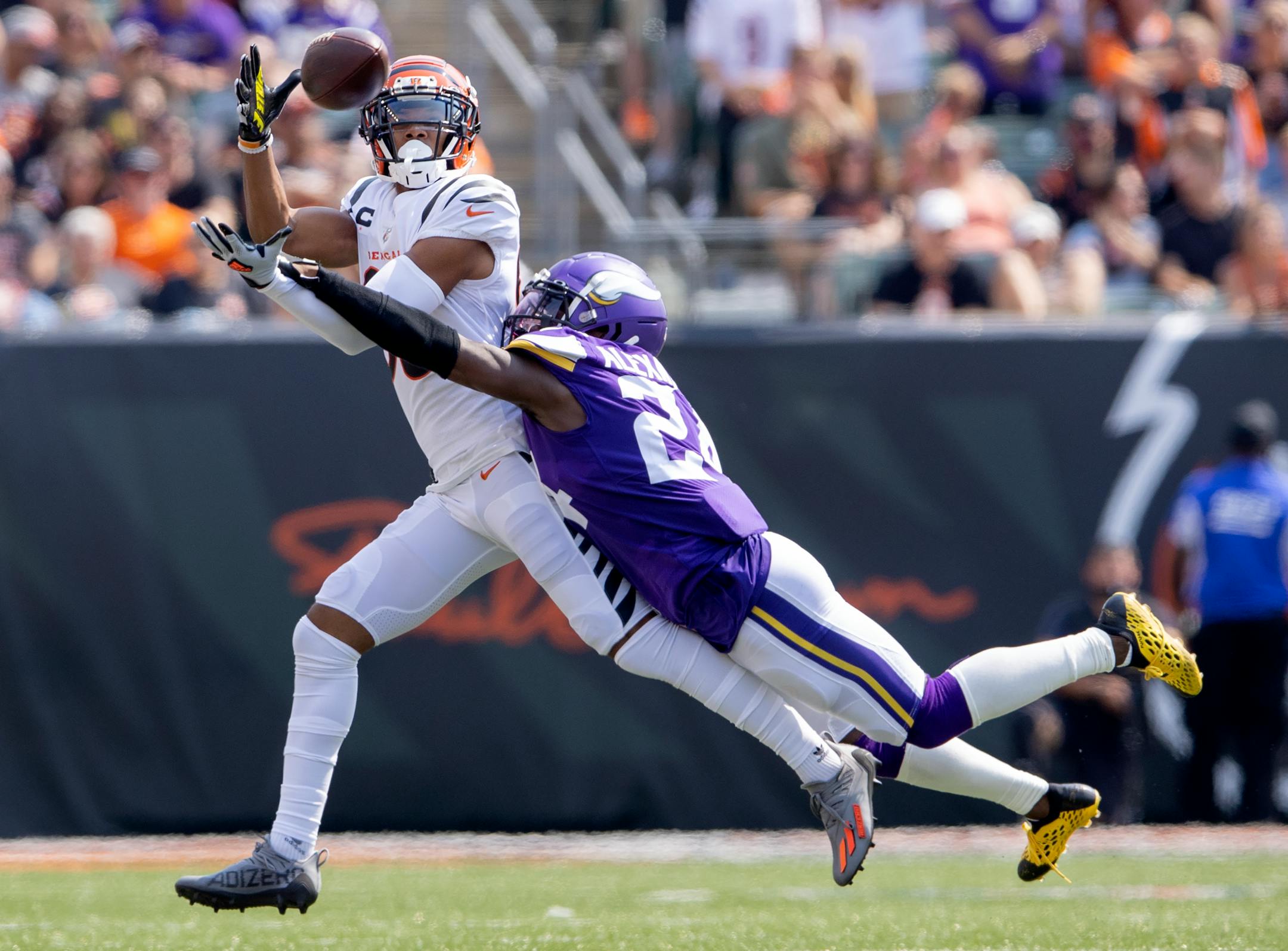 Cincinnati Bengals receiver Tyler Boyd (83) caught a pass while defended by Mackensie Alexander (24) of the Minnesota Vikings in the second quarter.