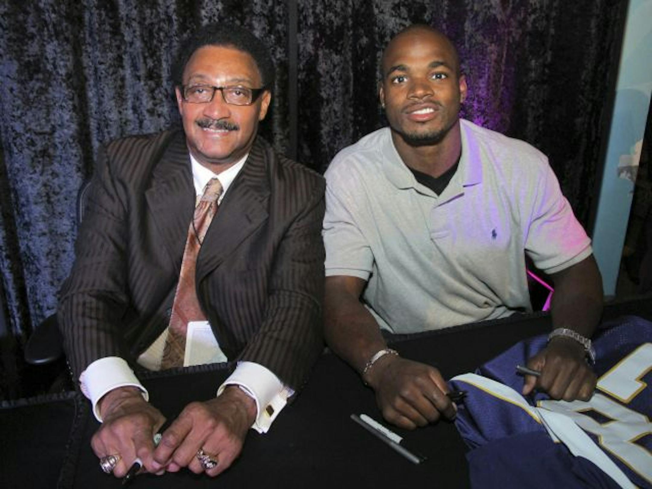Chuck Foreman and Adrian Peterson