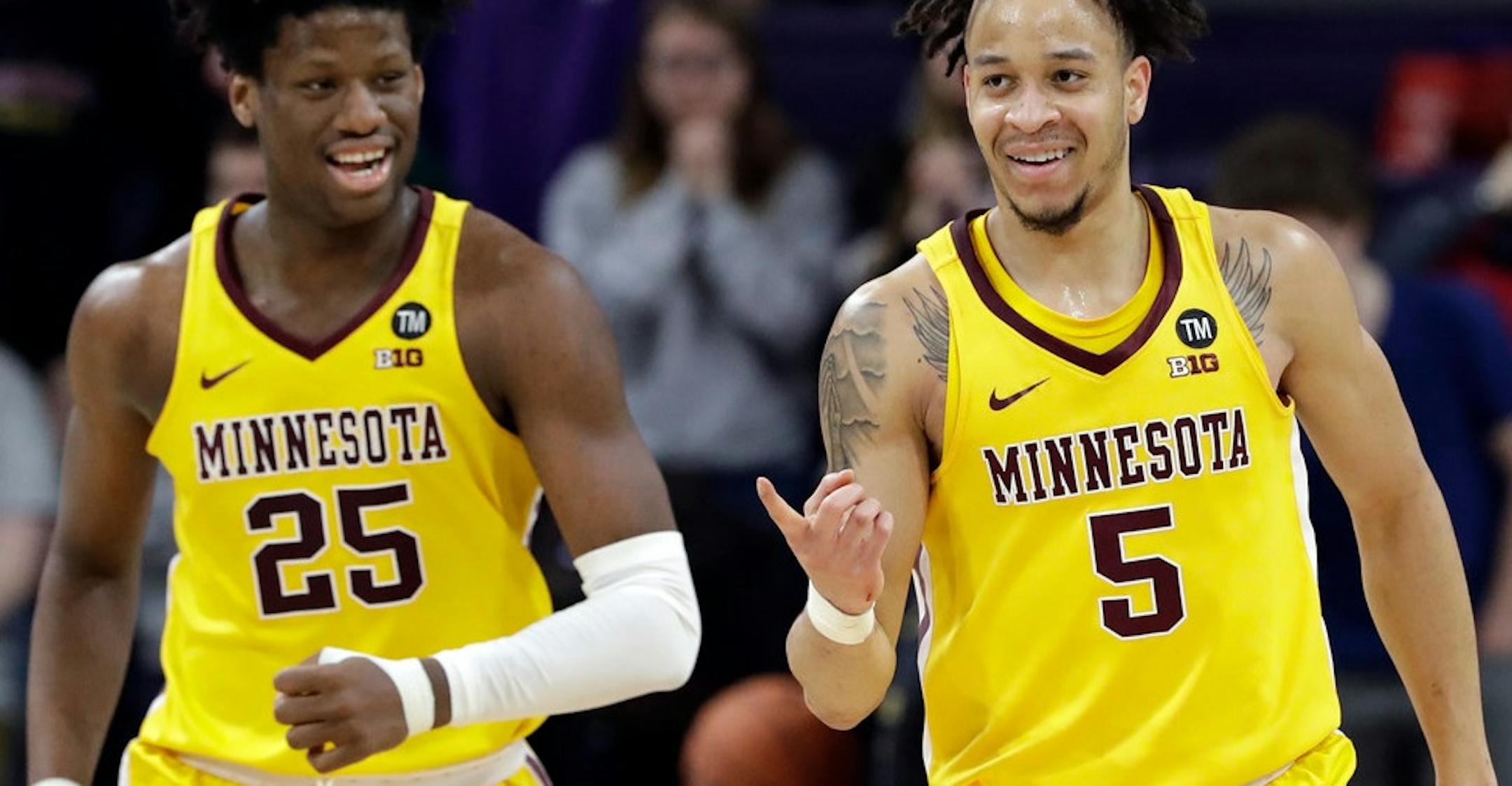 Daniel Oturu and Amir Coffey during the 2018-19 season. Oturu has declared for the NBA draft after Coffey, now with the Los Angeles Clippers, did the same last year.