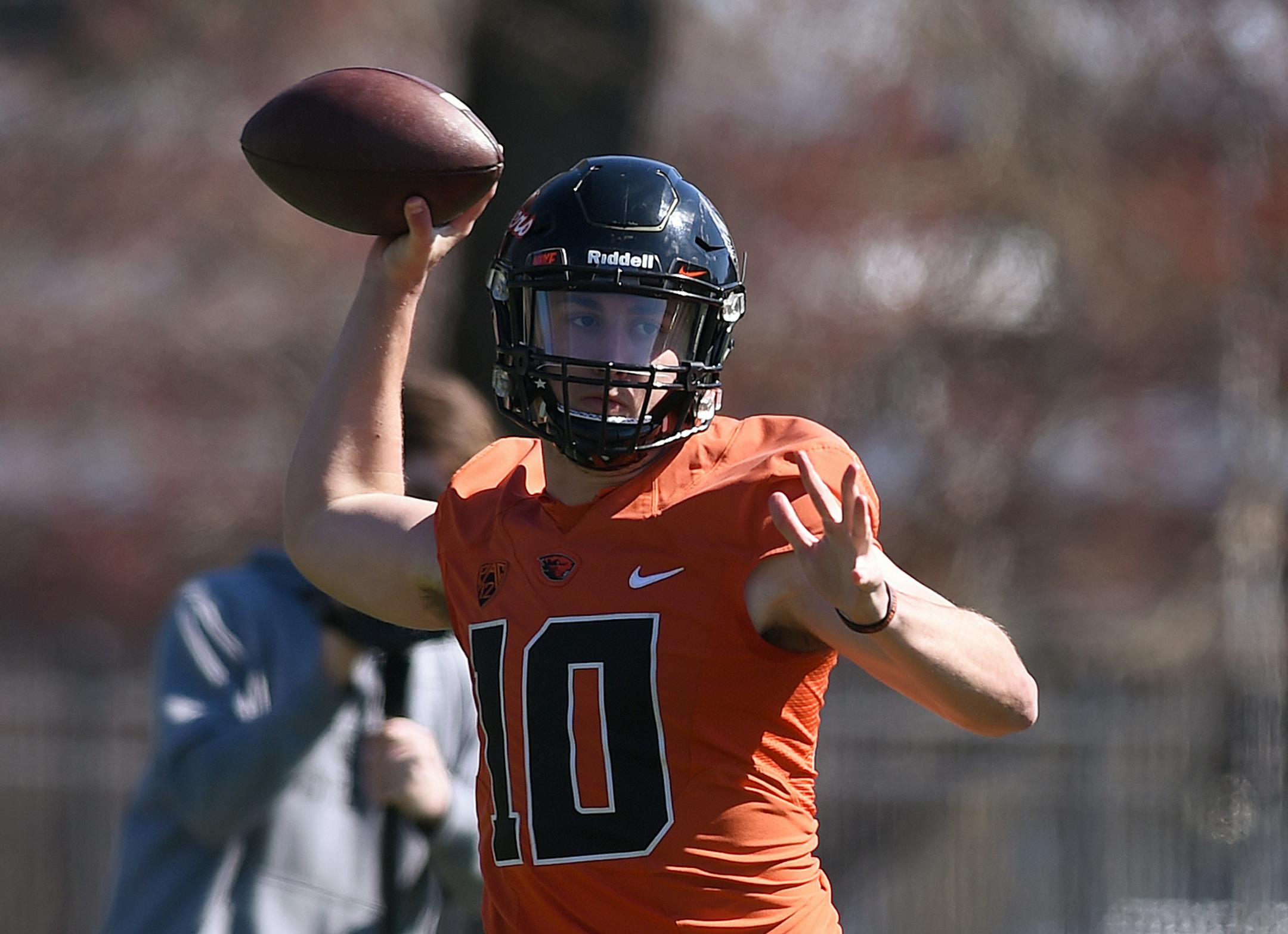 FILE - In this March 29, 2016 file photo, Oregon State Beavers quarterback Darell Garretson throws a pass during spring NCAA college football practice in Corvallis, Ore. After last season's quarterback carousel at Oregon State, Darell Garretson heads into this season as the established starter. (Godofredo Vasquez/The Corvallis Gazette-Times via AP, file)