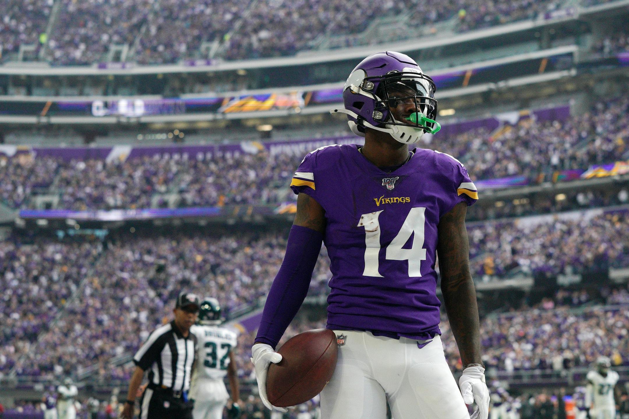 Minnesota Vikings wide receiver Stefon Diggs (14) reacted after scoring a touchdown early in the second quarter.