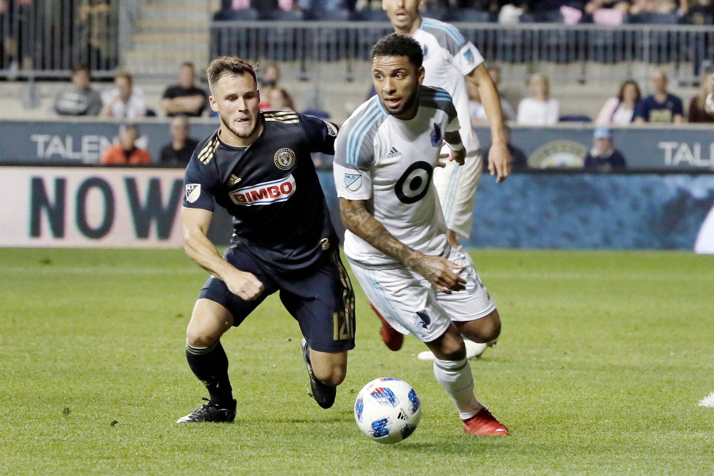 Philadelphia's Keegan Rosenberry and the Loons' Alexi Gomez chase the ball in the 2nd half Saturday night.