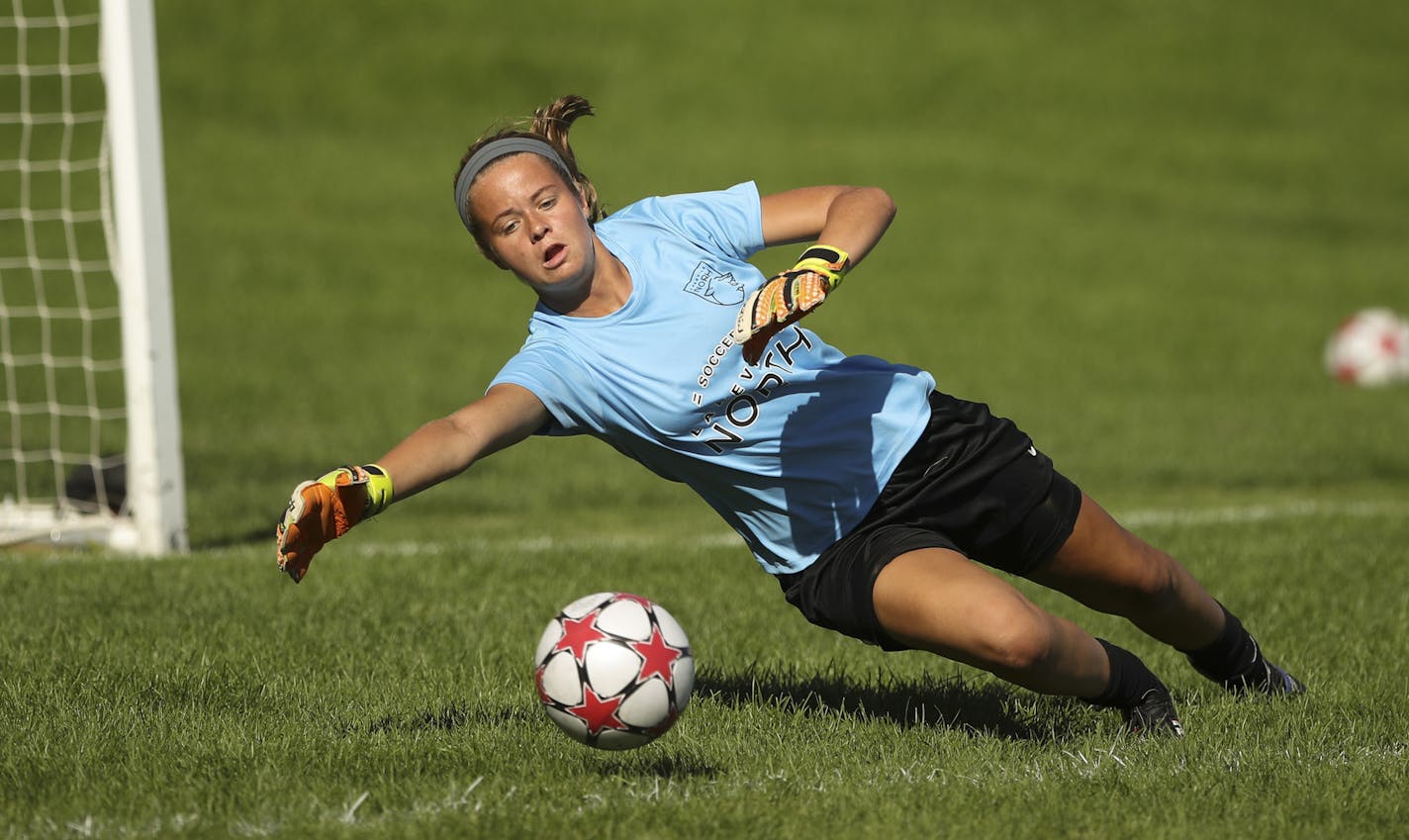 Lakeville North keeper Taylor Lock dived for a save attempt during practice (Jeff Wheeler/Star Tribune)