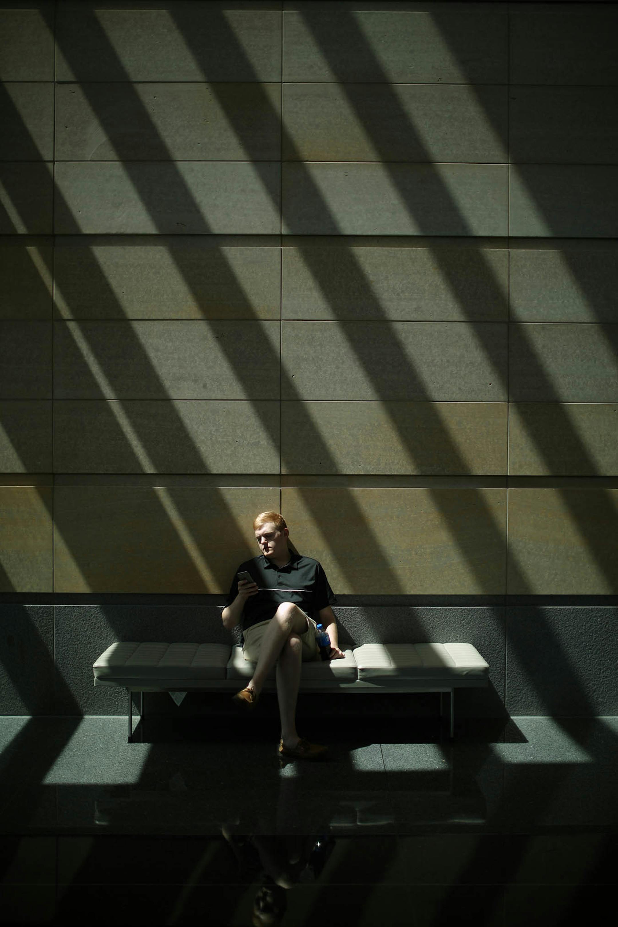 Will Dammann, a U of M student working at the legislature, took a break in the Senate Building Sunday afternoon. ] JEFF WHEELER ï jeff.wheeler@startribune Legislators worked Sunday to agree on spending, tax cuts, and borrowing ahead of their midnightt adjournment deadline Sunday, May 22, 2016.