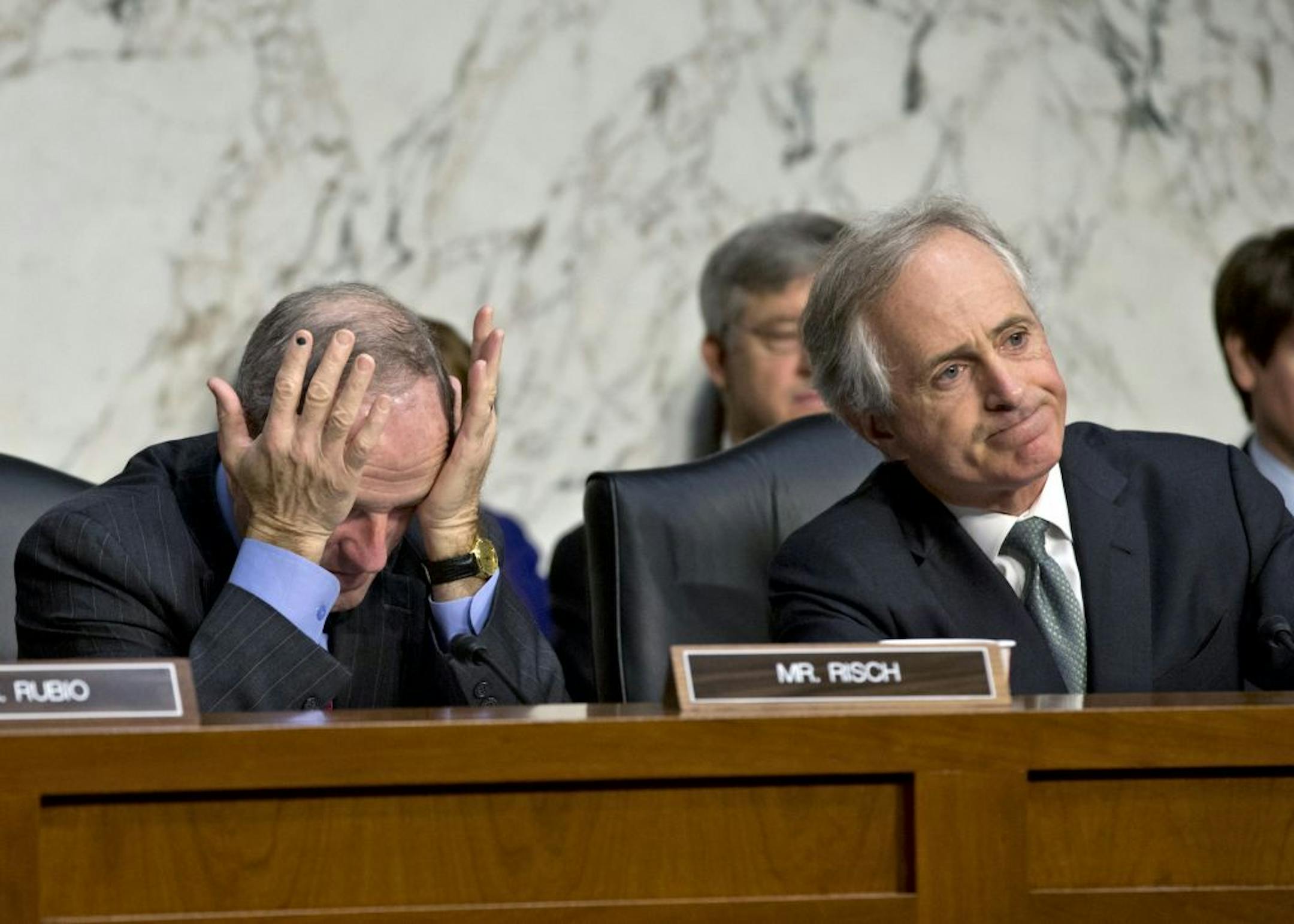 Sen. James Risch, R-Idaho, left, and Sen. Bob Corker, R-Tenn., listened to testimony on Thursday about the deadly attack on the U.S. diplomatic mission in Benghazi, Libya