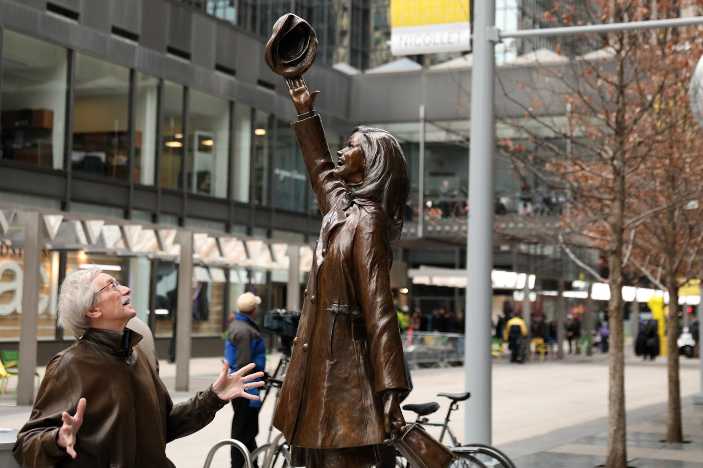 A man stopped to admire the statue of Mary Tyler Moore following a dedication ceremony to mark the opening of the newly renovated Nicollet Mall Thursday.