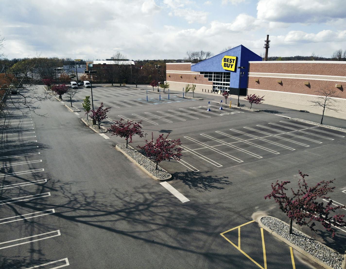 A Best Buy store in Woodland Park, N.J., is closed during the coronavirus pandemic on Thursday, April 16, 2020. Best Buy becomes the latest national chain to announce massive furloughs. The company will begin furloughing about 51,000 of its hourly employees, including nearly all of its part-time hourly employees and a small portion of its full-time hourly employees starting Sunday. Best Buy will begin voluntary, temporary reduced work weeks as well. (AP Photo/Ted Shaffrey)