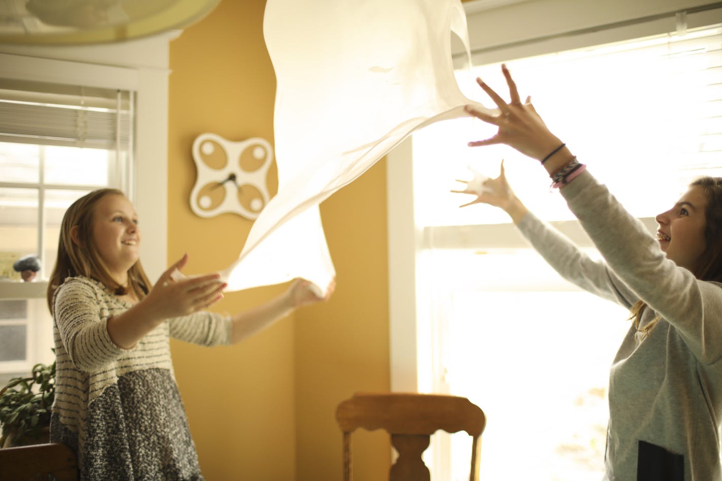 Annabell Sorensen, left, and Petra Lyon, both 12, tested the elasticity of some slime.