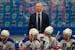 Unted States' head coach John Hynes looks out from the bench during the preliminary round match between United States and Kazakhstan at the Ice Hockey