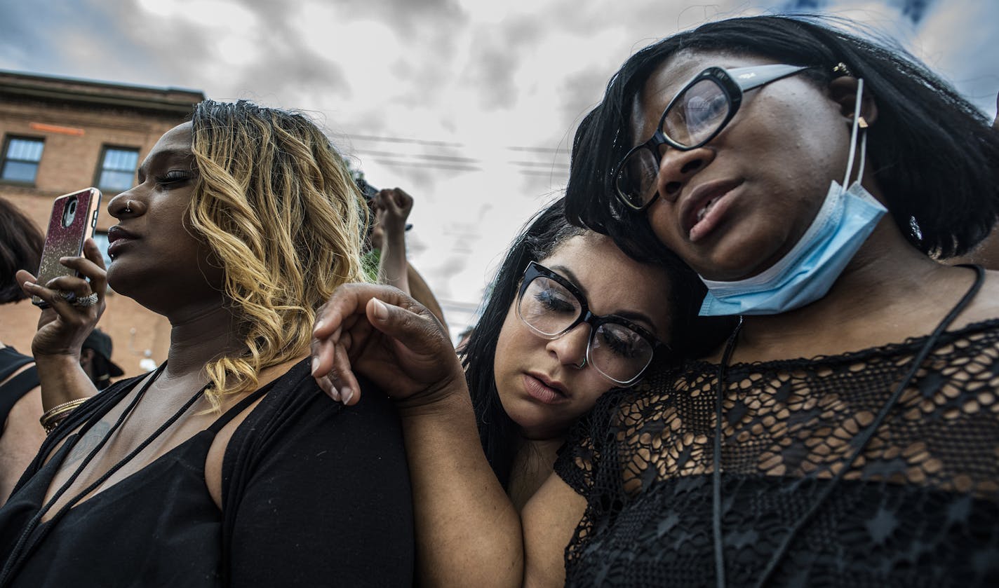 Mourners stood outside to hear a broadcast of Thursday's memorial service for George Floyd. Hundreds stood outside the service at North Central University in downtown Minneapolis.