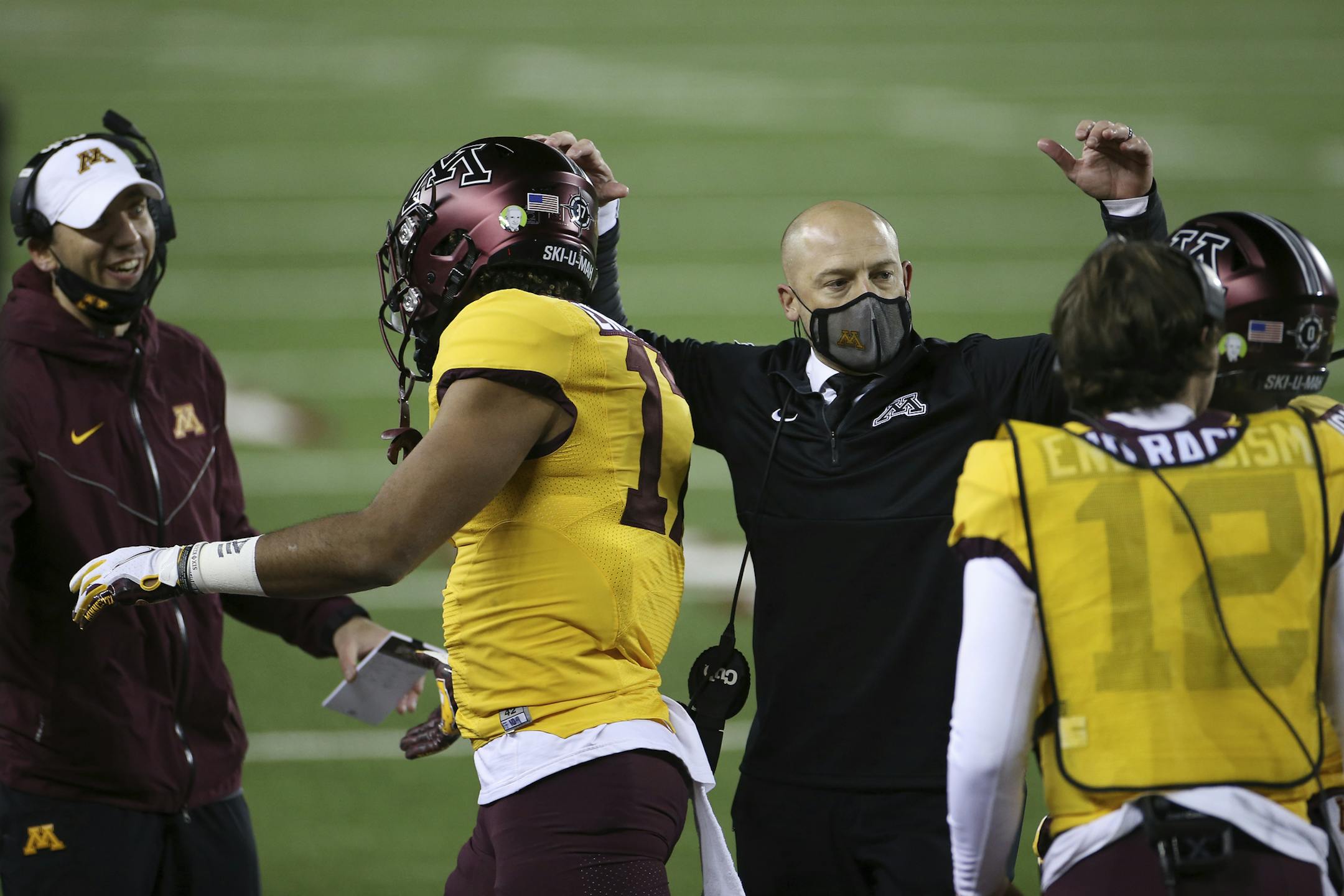 Gophers football coach P.J. Fleck encouraged his players during Friday's 34-31 victory over Purdue.