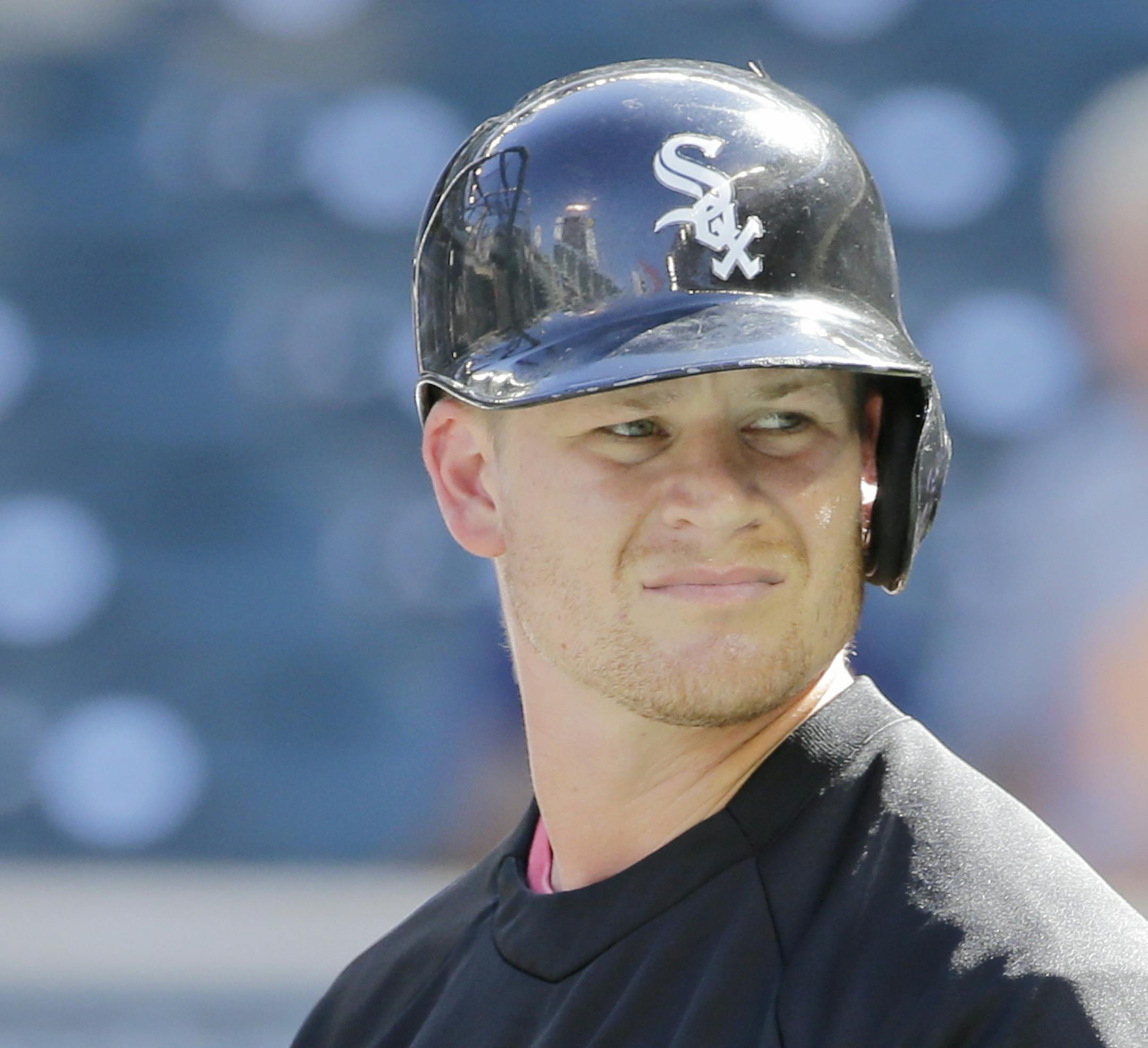 Chicago White Sox second baseman Gordon Beckham waits to bat before a baseball game against the Minnesota Twins in Minneapolis, Saturday, July 26, 2014. (AP Photo/Ann Heisenfelt) ORG XMIT: MIN2014082217375745