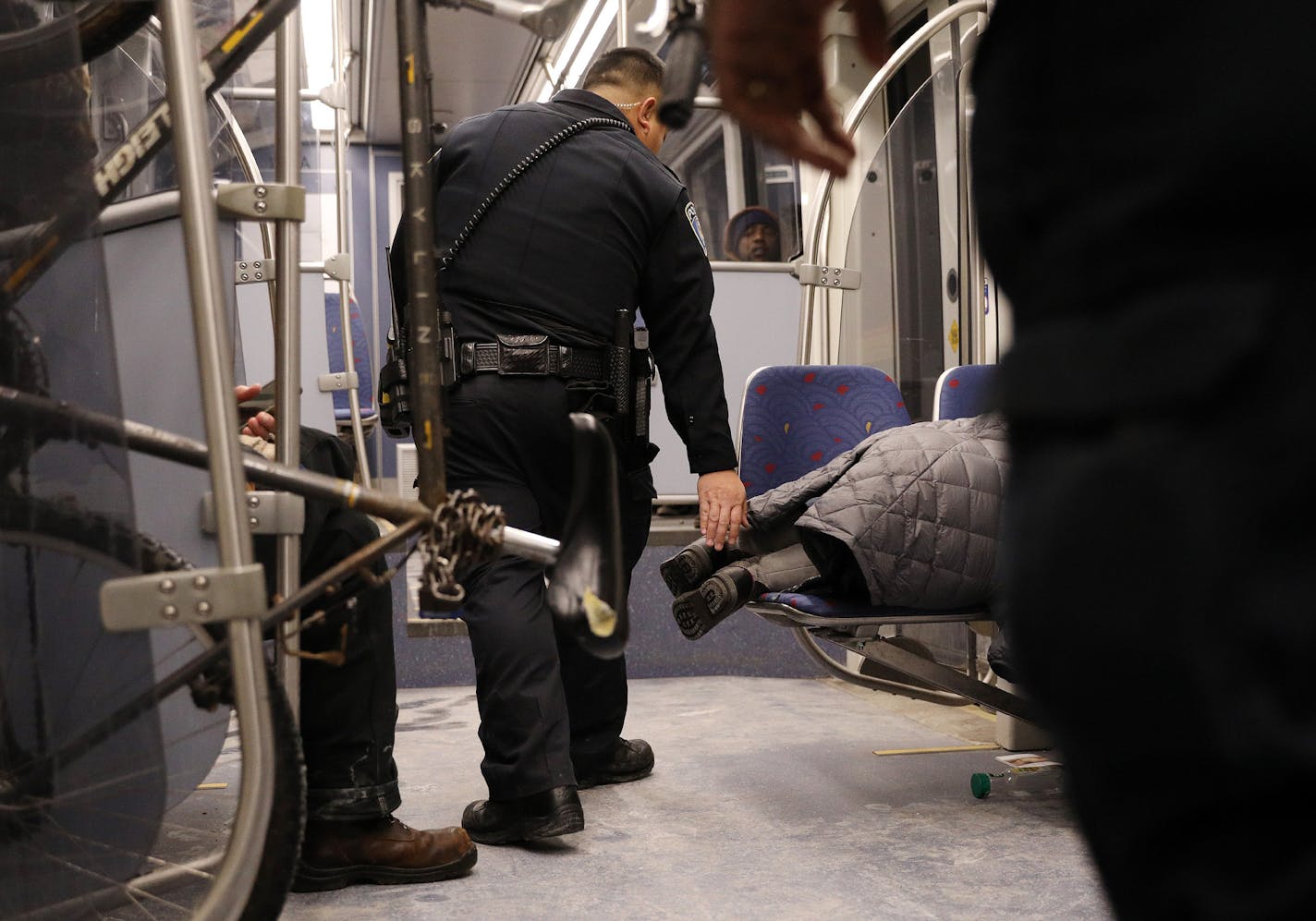 Metro Transit police woke a woman who was sleeping across two seats at night on a light-rail train on Dec. 22.