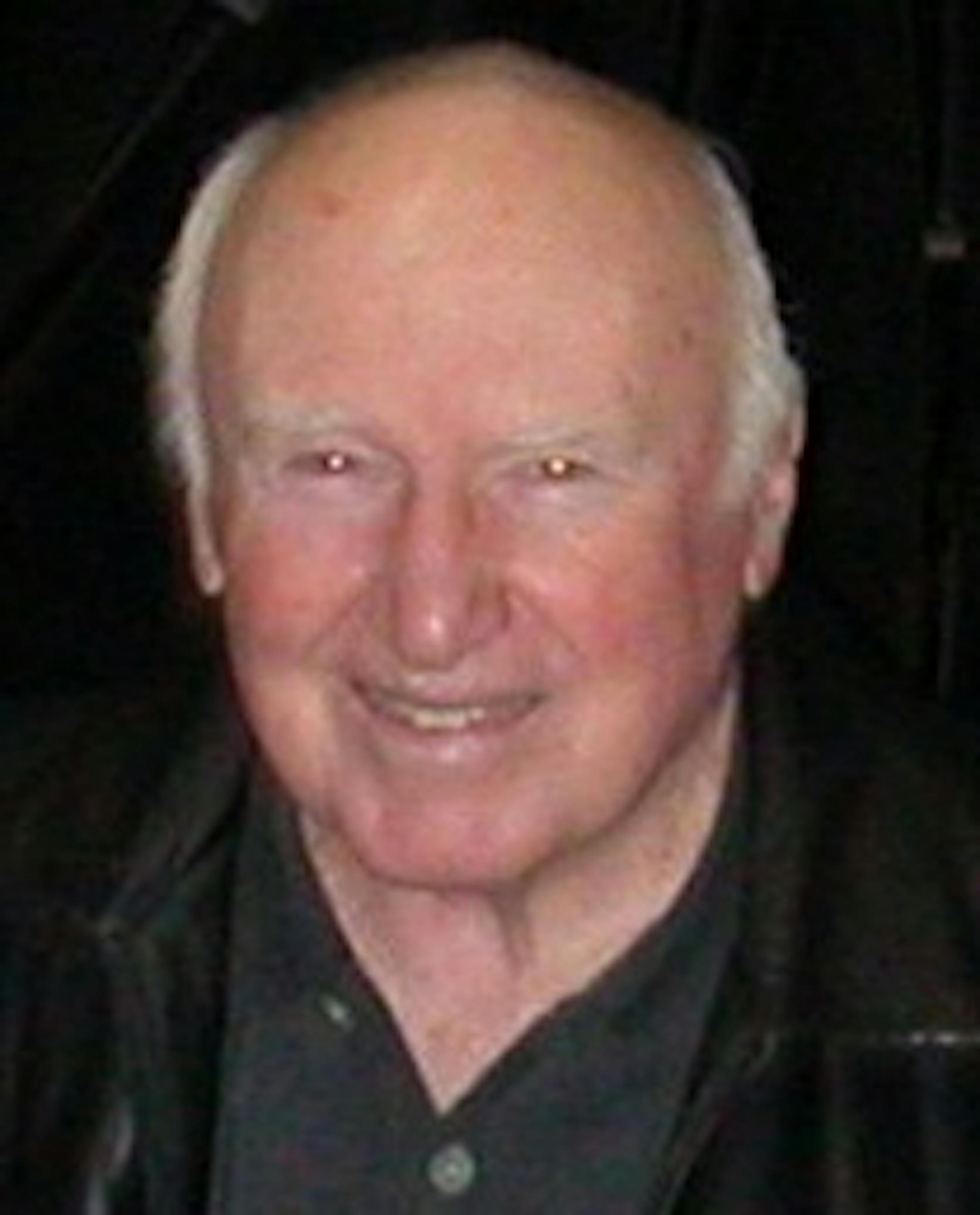 James Grogan (center)