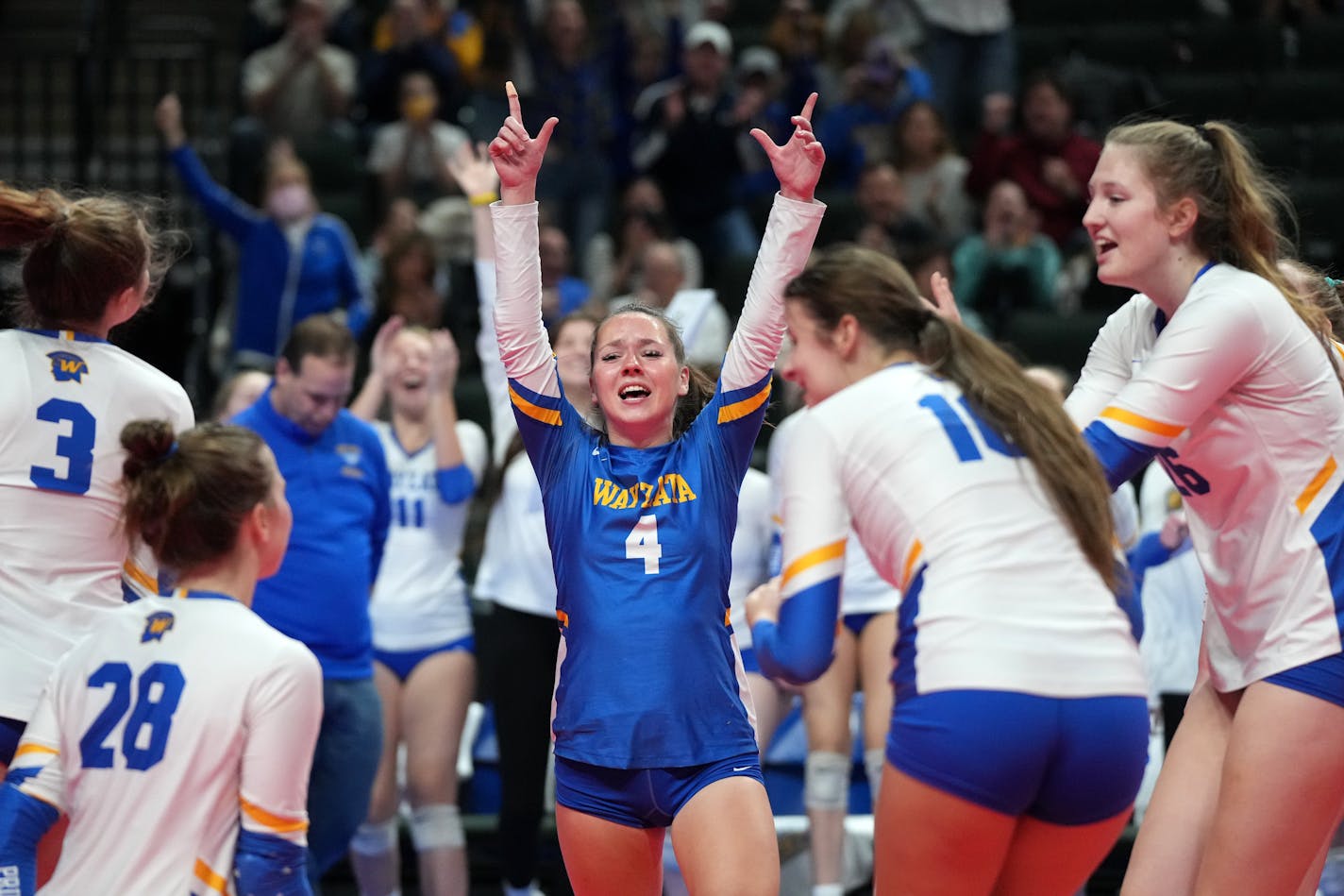 Wayzata libero Ella Voegele (4) celebrates a point in the first set as Wayzata High School played Rogers High School in the girls Class 4A volleyball state tournament semifinals Thursday, Nov. 11, 2021 at the Xcel Energy Center in St. Paul, Minn. ] ANTHONY SOUFFLE • anthony.souffle@startribune.com ORG XMIT: MIN2111111539330191