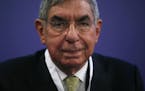 FILE - In this Nov. 13, 2015 file photo, Costa Rican 1987 Nobel peace laureate and former president of Costa Rica, Oscar Arias, looks at the media dur