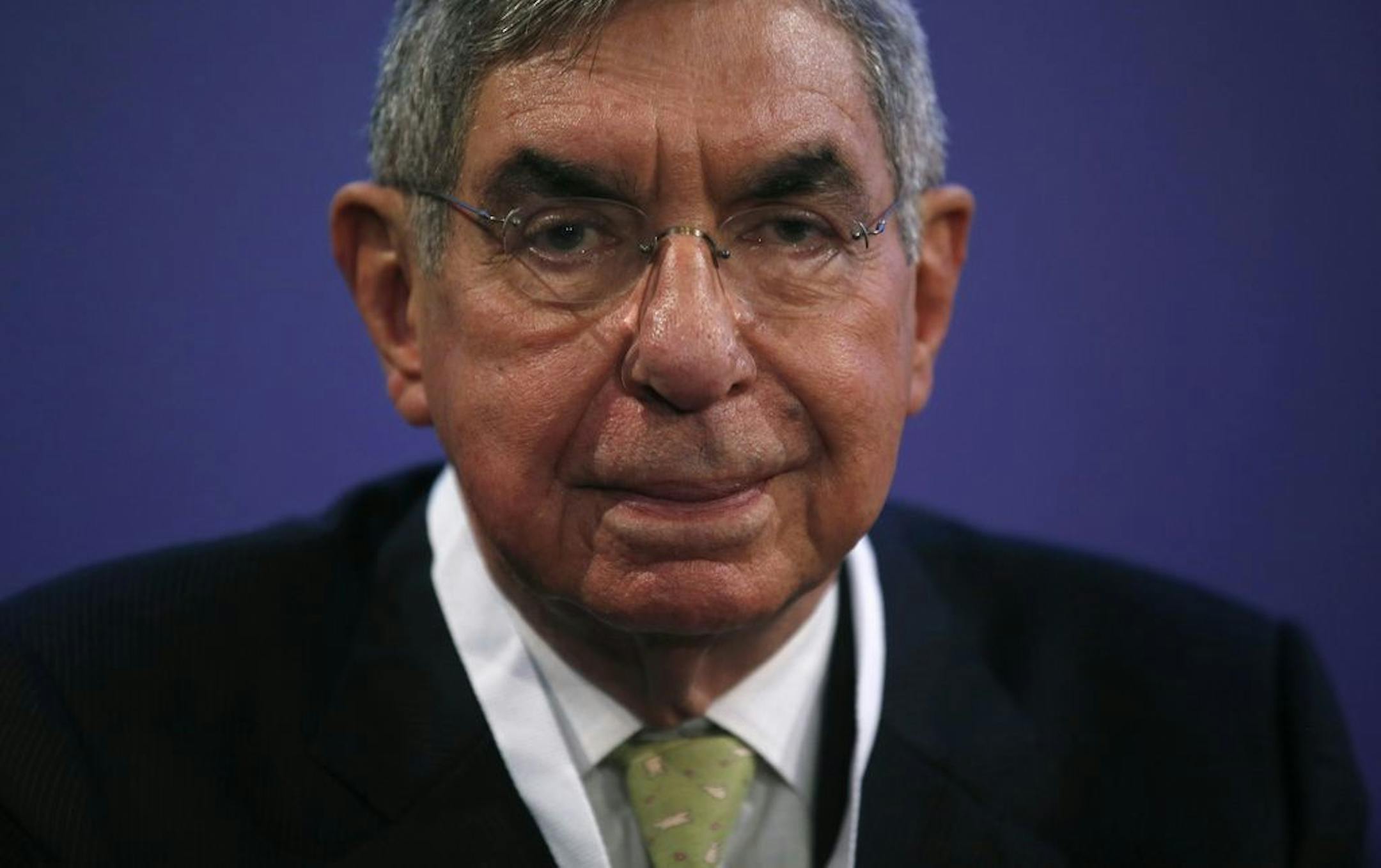 FILE - In this Nov. 13, 2015 file photo, Costa Rican 1987 Nobel peace laureate and former president of Costa Rica, Oscar Arias, looks at the media during the opening ceremony of the XV World Summit of Nobel Peace Laureates at the University in Barcelona, Spain. Arias has been accused of sexual assault by a nuclear disarmament activist, a charge he denies. She filed a criminal complaint on Monday, Feb. 4, 2019.