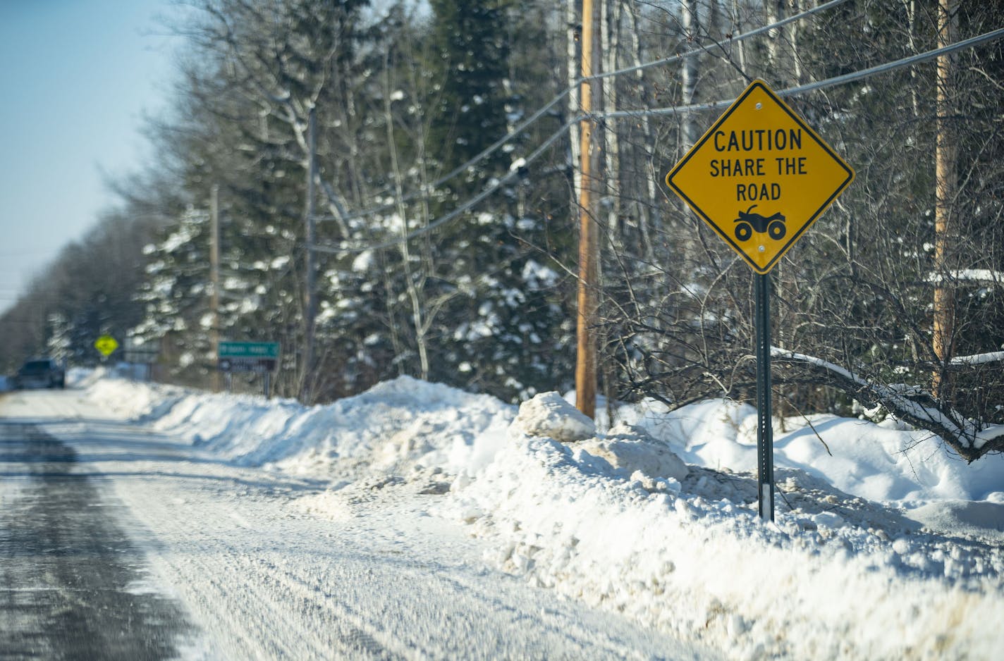 Signs imploring drivers to share the road with ATVs are scattered around the county roads in Superior, WI . ]
ALEX KORMANN &#x2022; alex.kormann@startribune.com The city of Superior, WI is asking voters if they want to allow ATVs to be driven on city streets.