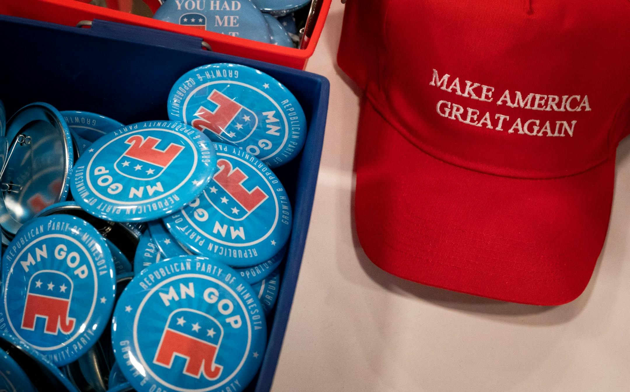 MNGOP buttons and MAGA hats at the second day of the Republican state convention in Duluth.