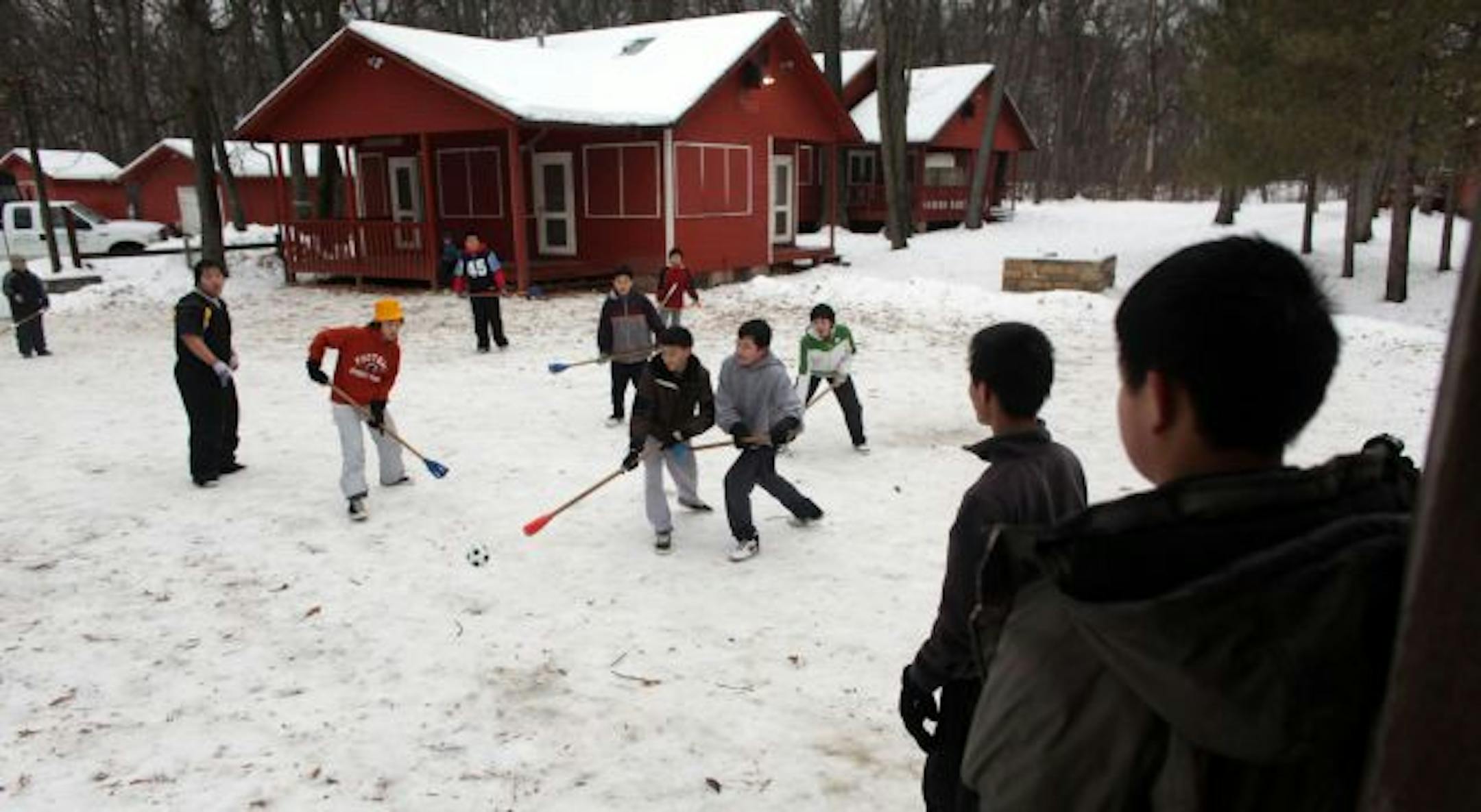Despite icy grounds, the Boy Scouts of Troop 100 got their broomball on at Camp Ajawah in Wyoming, Minn. The camp is a favorite and frequent destination of the troop.