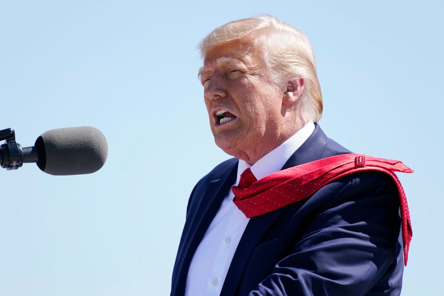 President Donald Trump speaks to a crowd of supporters at Minneapolis-St. Paul International Airport, Monday, Aug. 17, 2020.