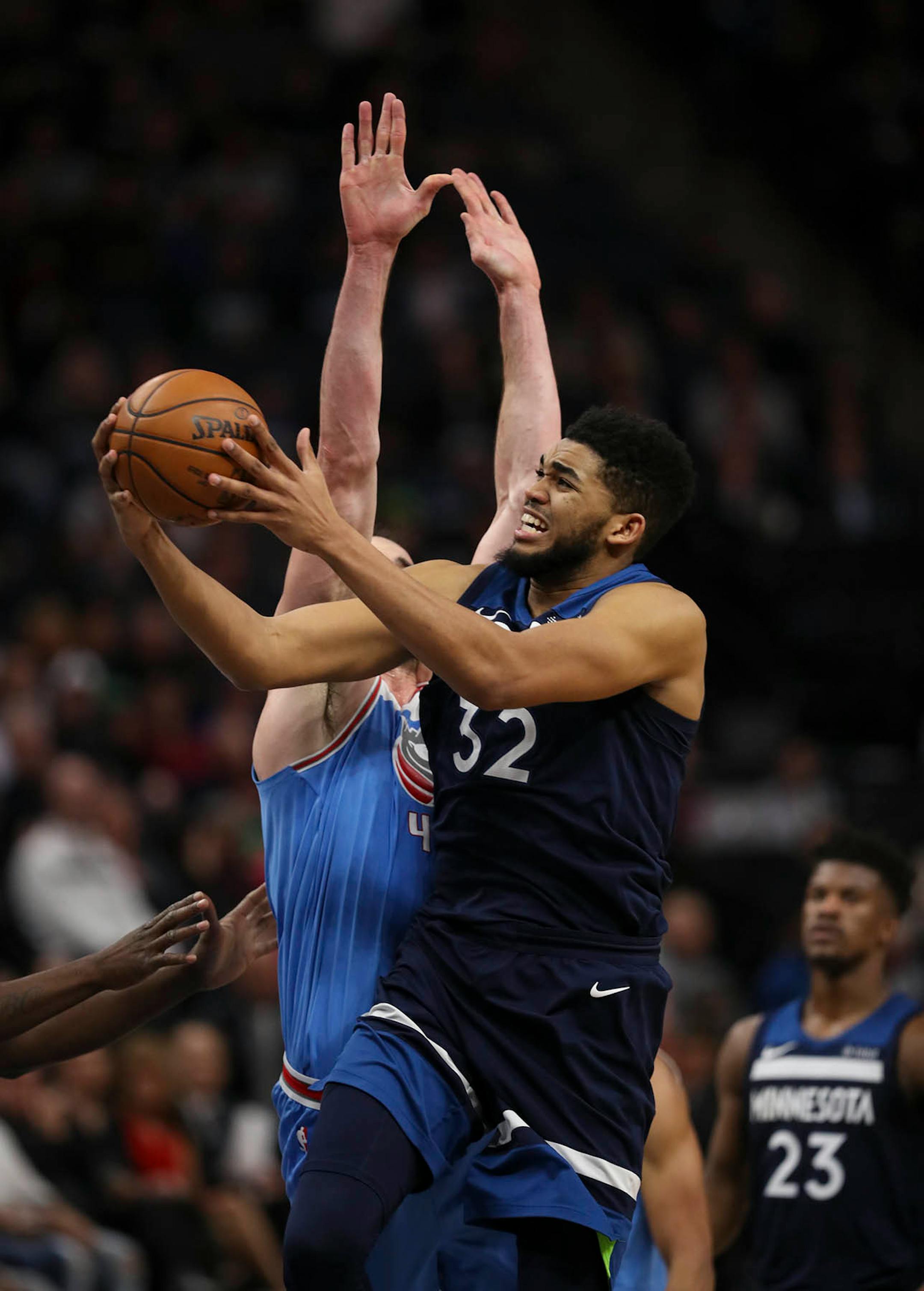 Minnesota Timberwolves center Karl-Anthony Towns (32) put up a fourth quarter shot over the defense of Sacramento Kings center Kosta Koufos (41). Towns led all scorers with 29 points.