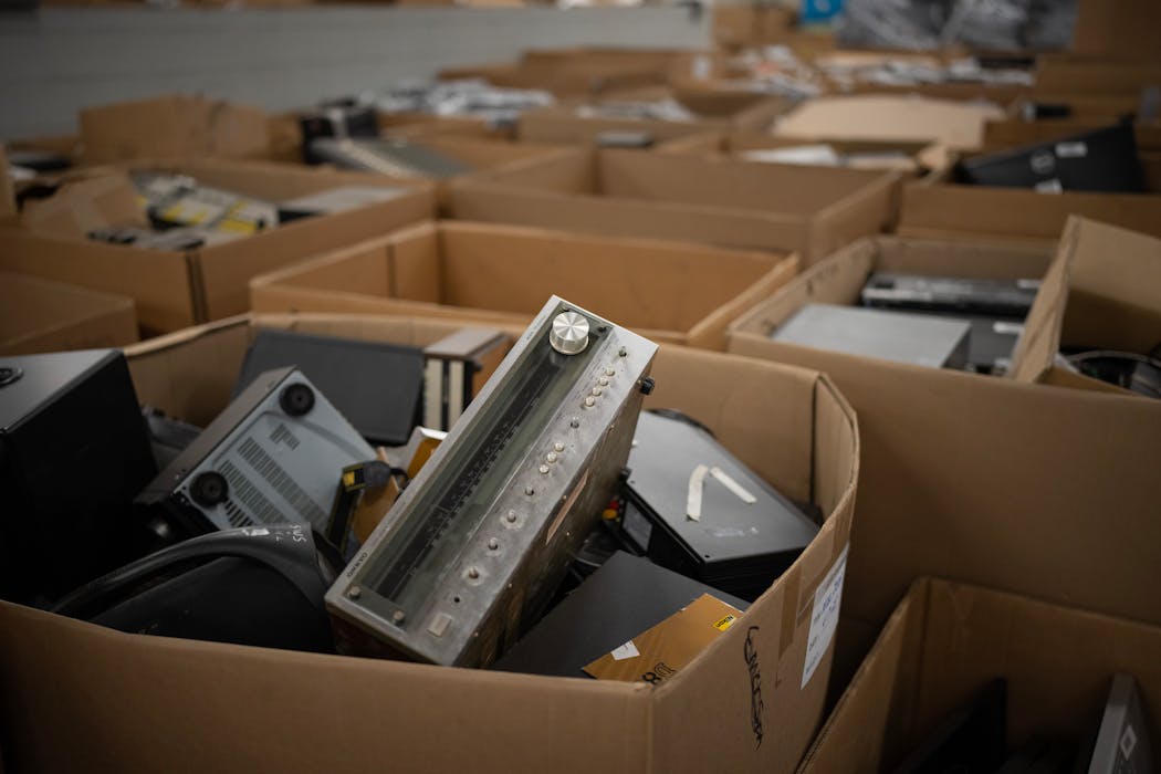 Boxes and boxes with discarded consumer electronics await further processing at Repowered in St. Paul Wednesday afternoon, May 3, 2023.