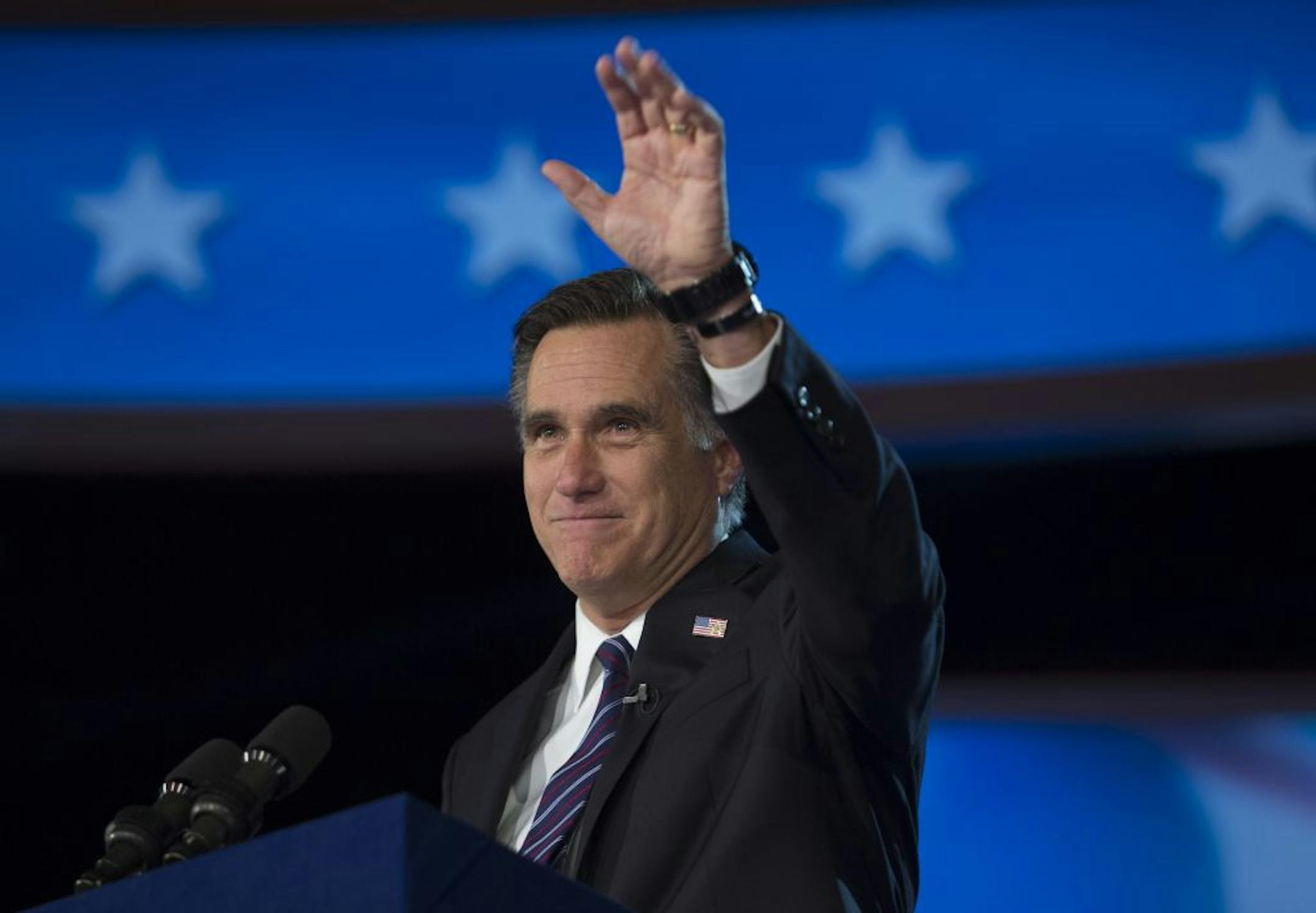 Mitt Romney gives his concession speech at his election event at the Boston Convention and Exhibition Center in Boston, following Election Day, early Wednesday morning, Nov. 7, 2012.